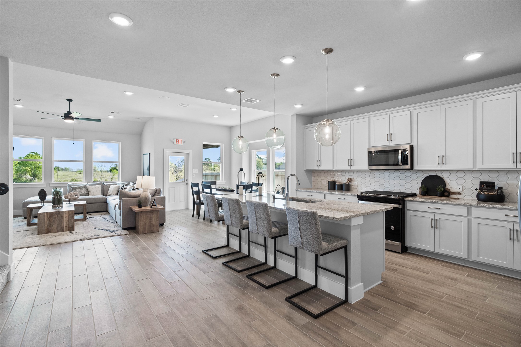 Enjoy seamless sightlines across the open-concept kitchen, dining and living areas, making entertaining a breeze and ensuring you're never far from the conversation.