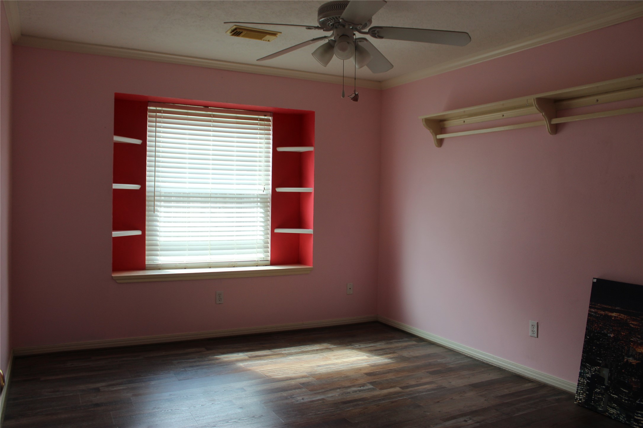 Another bedroom with built in shelves