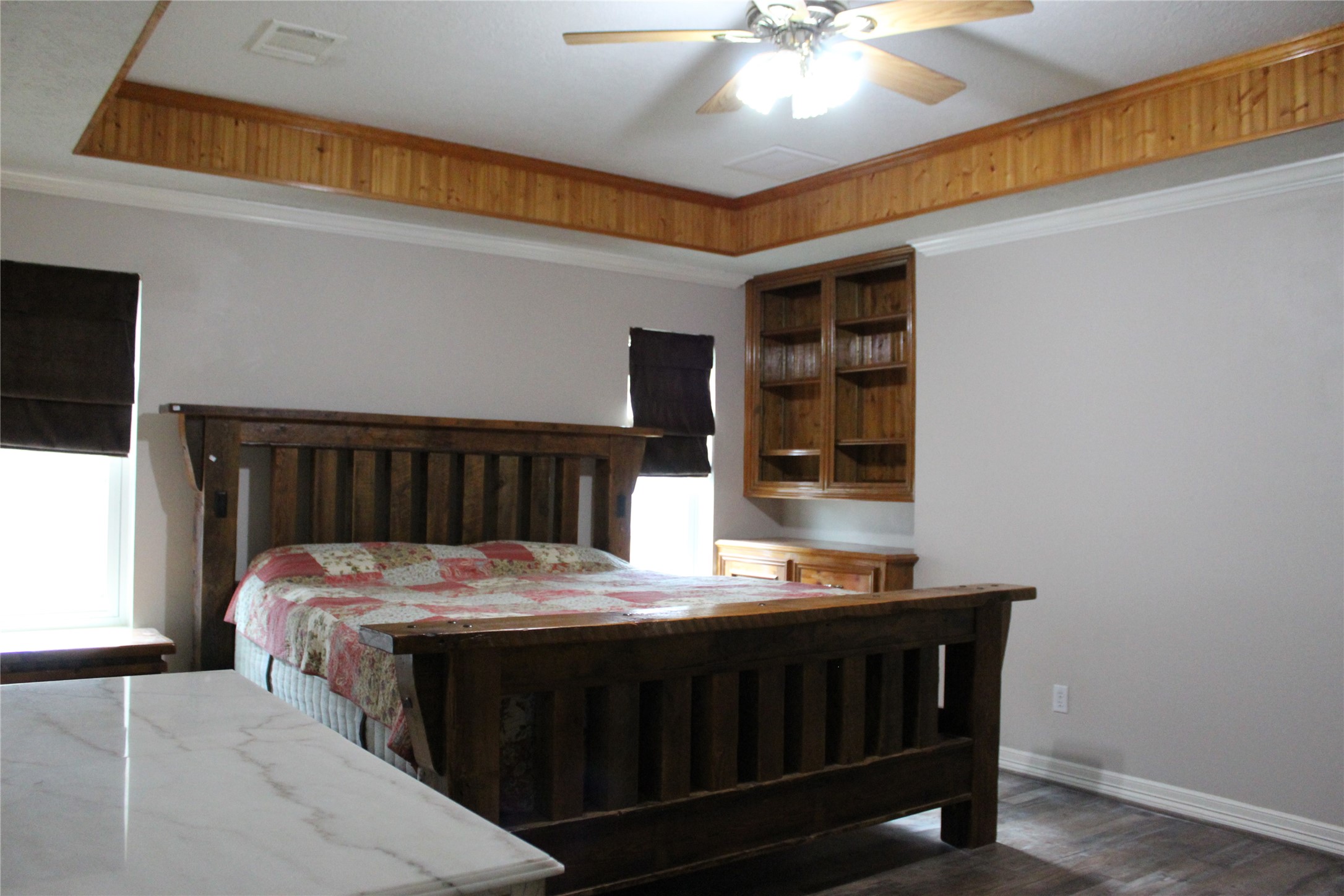 Master bedroom with custom tray ceiling