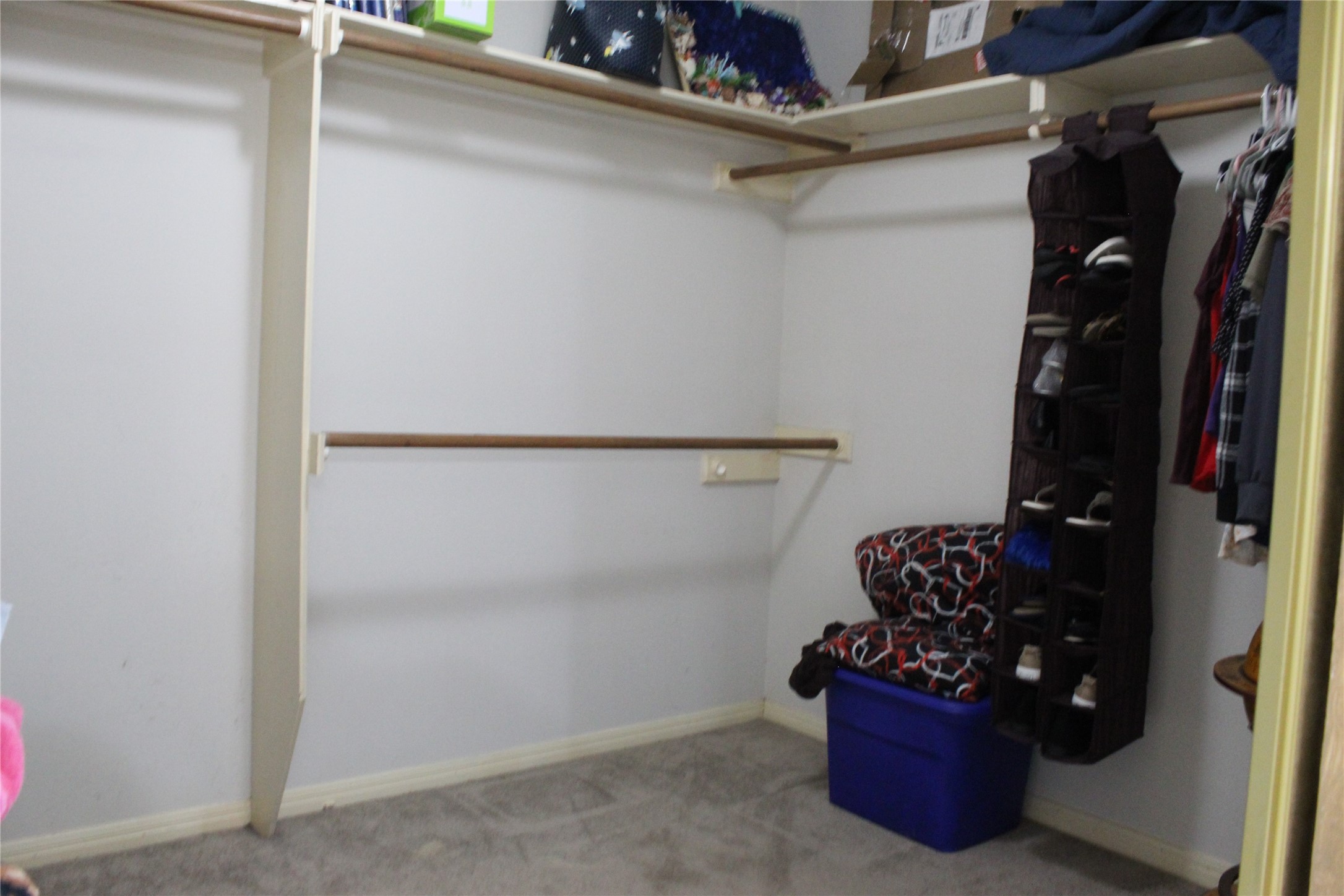 Large walk in closet with built in storage