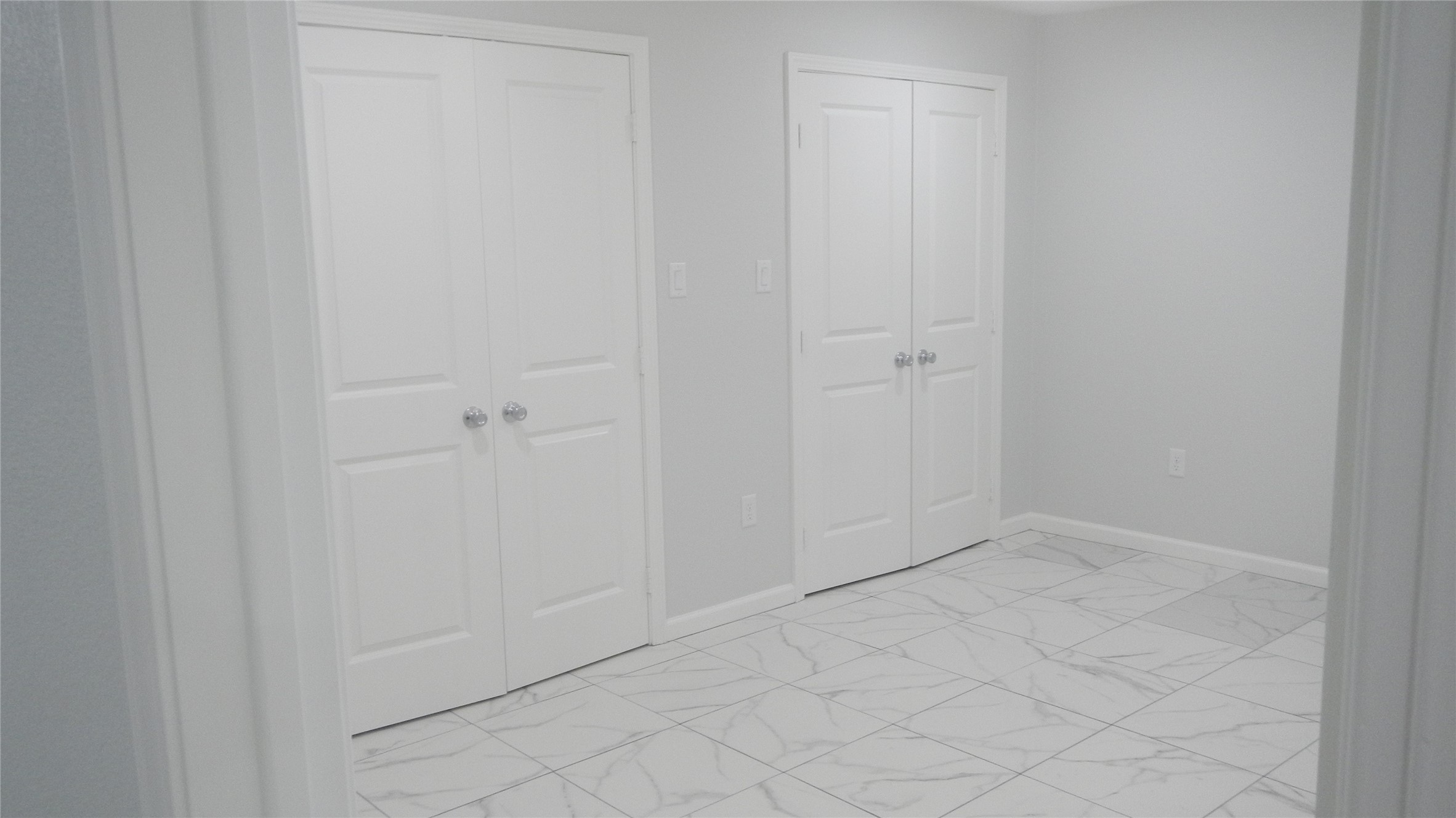 Second view of walk in closets