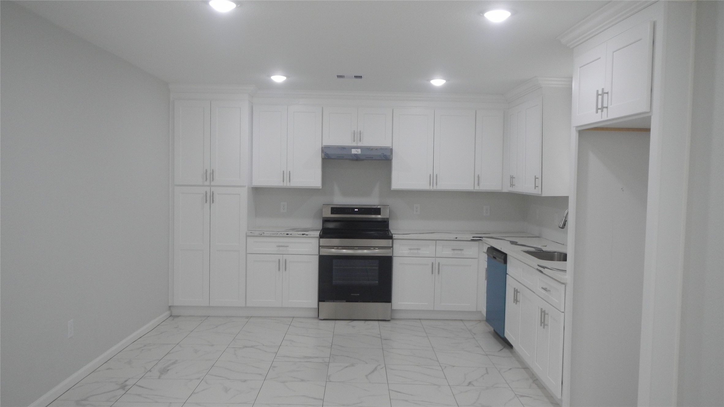 Spacious kitchen with plenty of cabinets