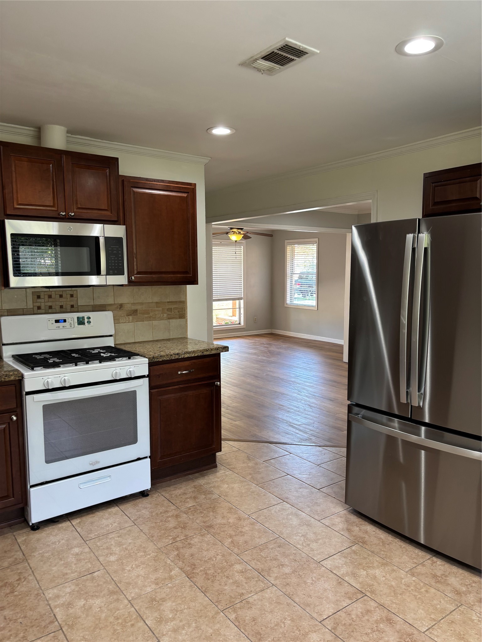 Brand new refrigerator with water and Ice and a brand new microwave oven