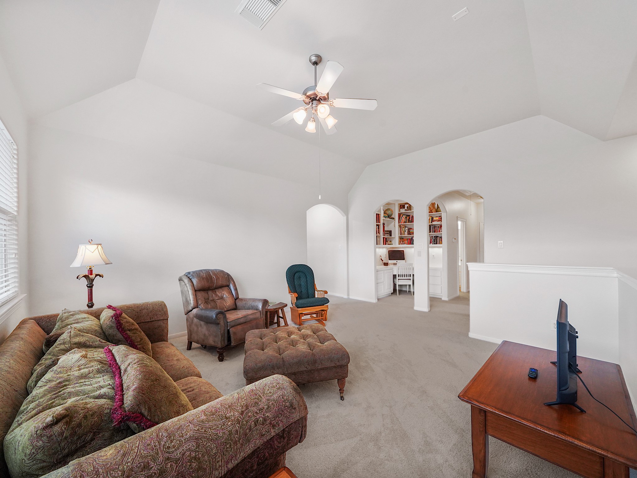With its open scale and comfortable layout, the game room easily adapts to a media lounge, play space, or casual retreat.