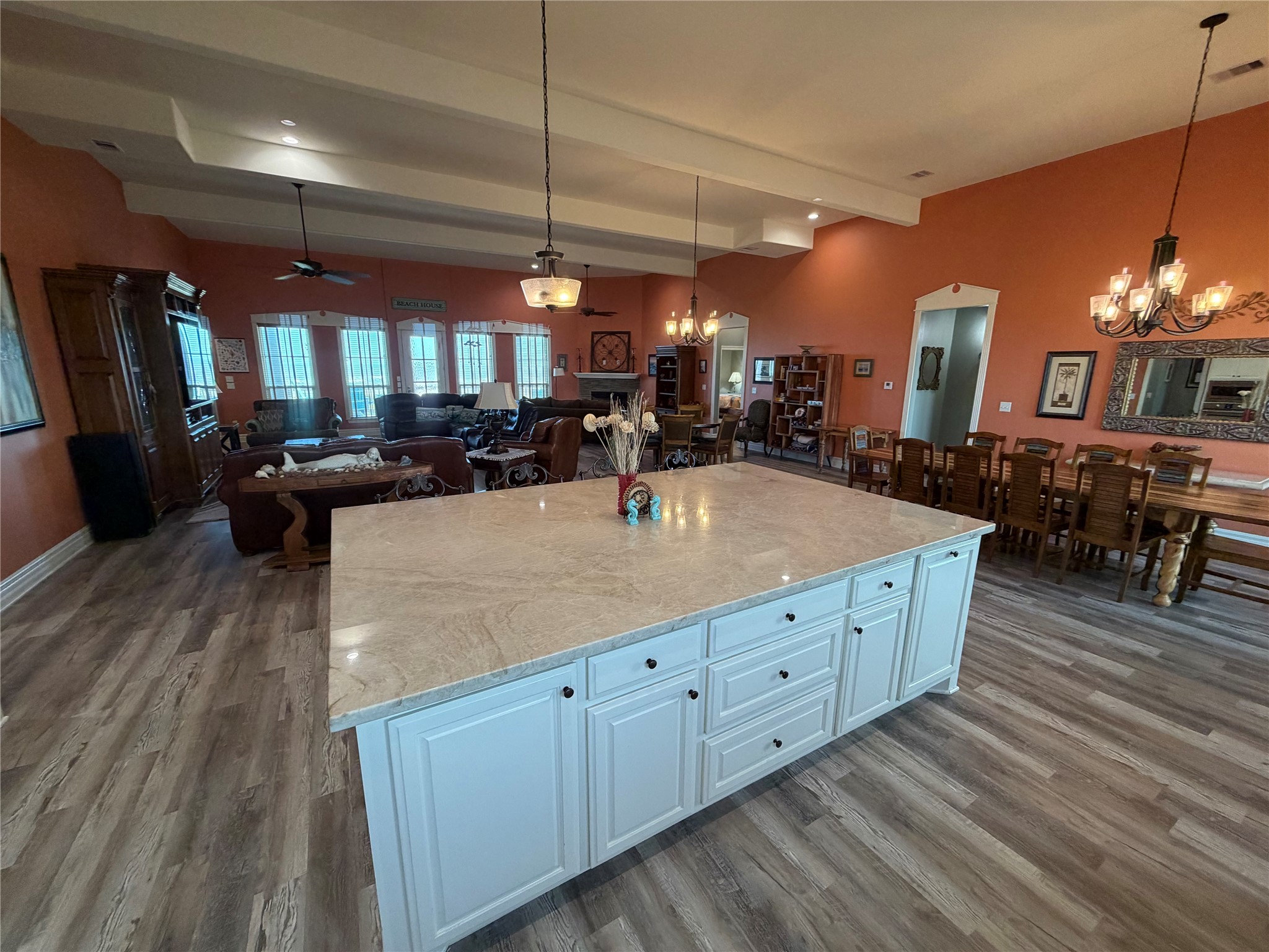 View from behind island towards living and dining area