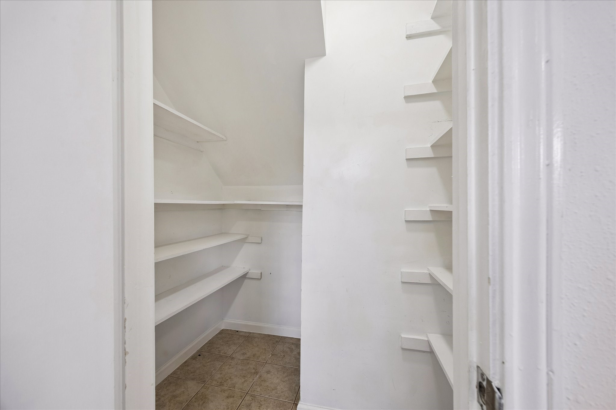 Very large walk in pantry big enough for even the most creative chefs