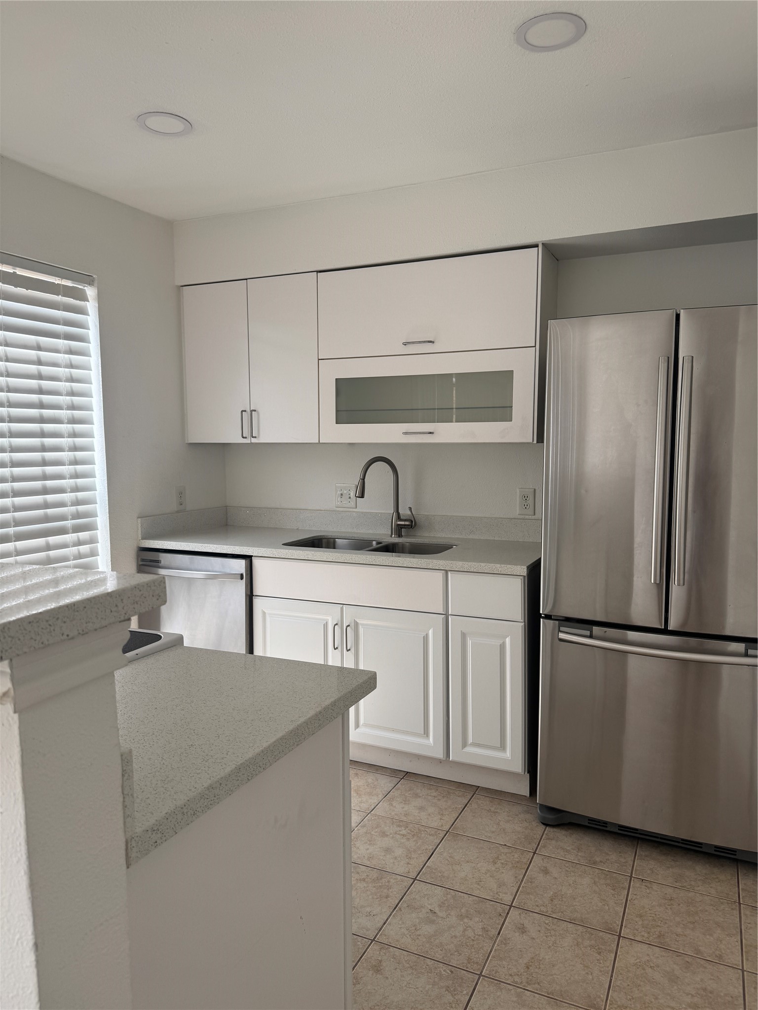 Clean clean clean.  Stainless appliances, new cabinets, and beautiful granite.