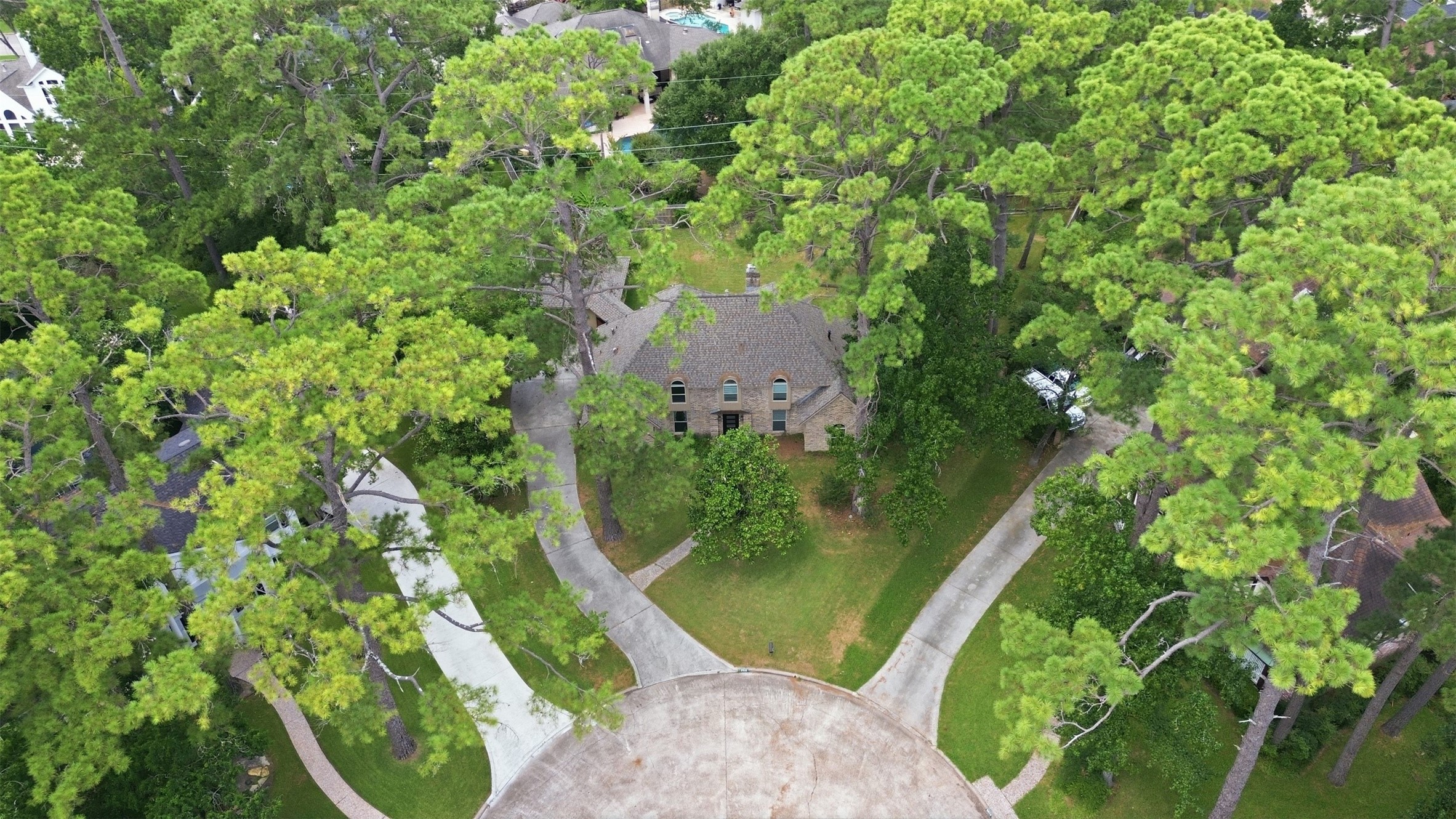 Tucked at the end of a quiet cul-de-sac, this expansive lot is beautifully surrounded by mature trees.