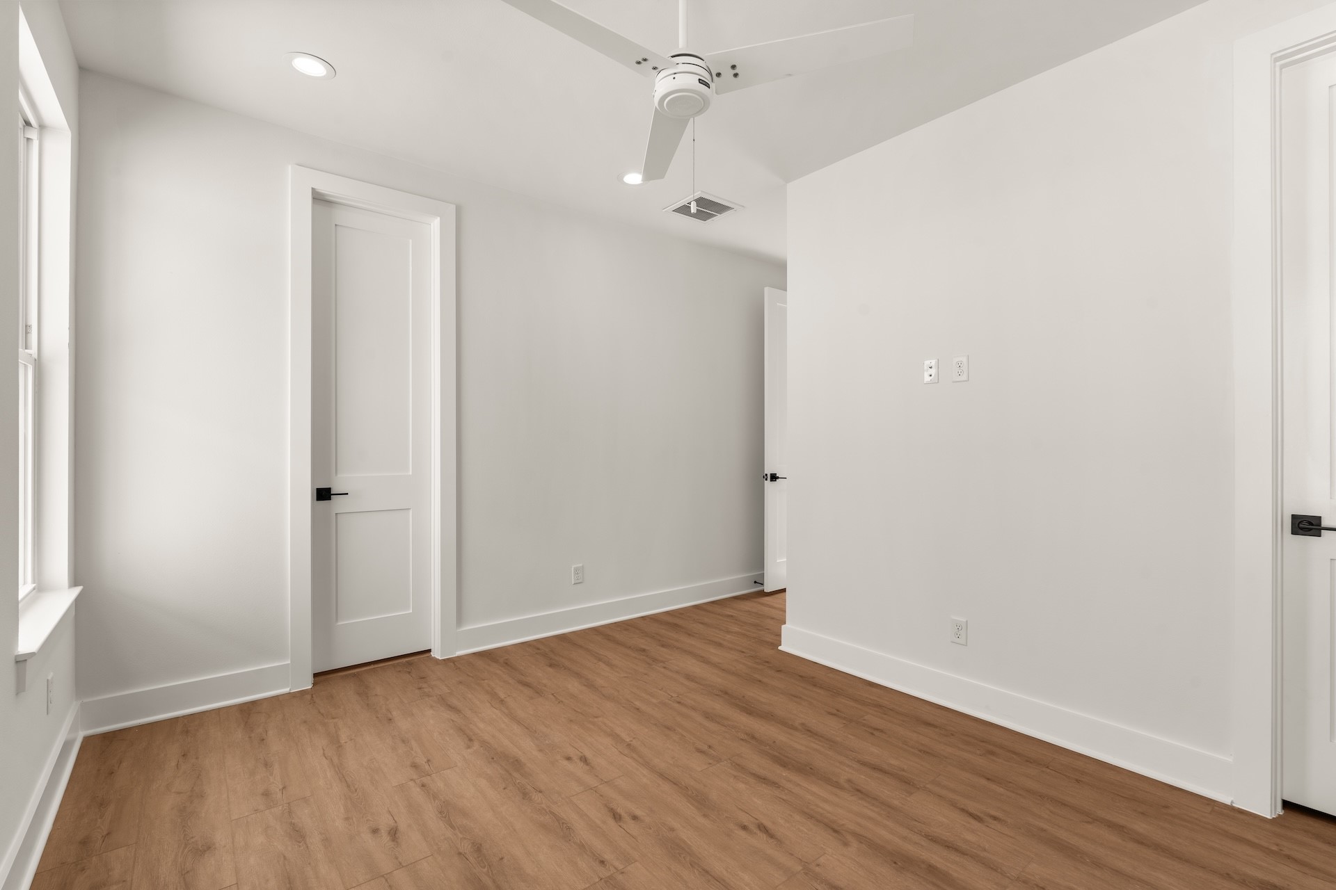 Quiet guest retreat offering flexible space and seamless flow to adjacent living areas.