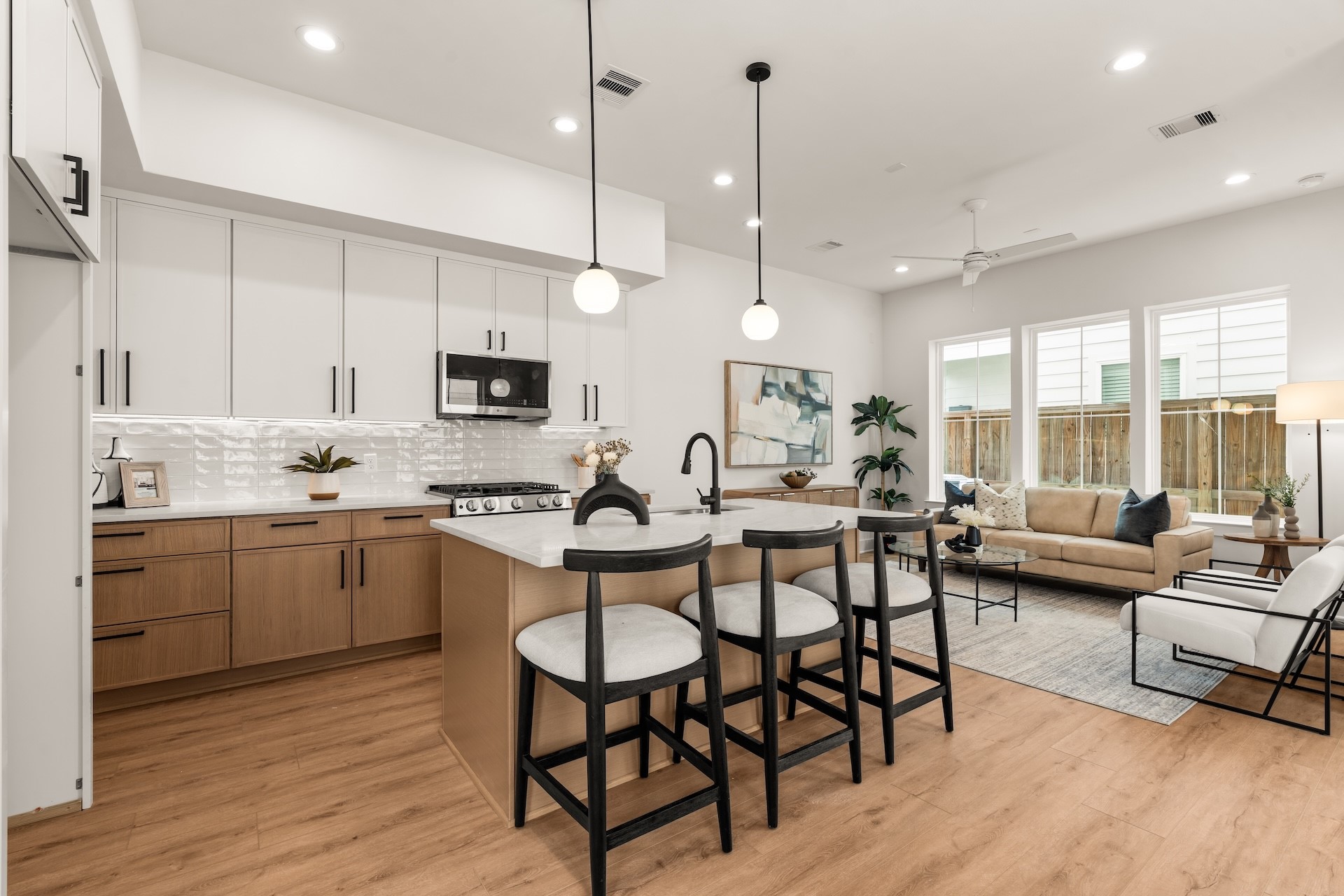 Open-concept main level connecting the kitchen directly to the spacious family room.
