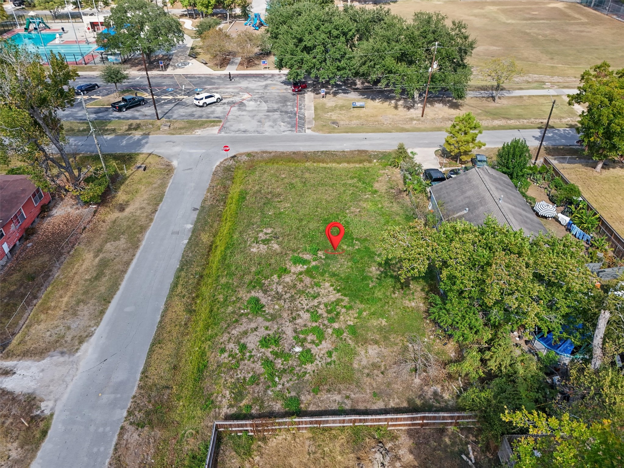 Build your dream home on this spacious, cleared corner lot! With minimal trees and existing structures to remove, this property offers a great starting point for your future home. Enjoy road frontage on two sides, an established neighborhood, and nearby recreational amenities. The red marker highlights this fantastic opportunity to bring your vision to life!