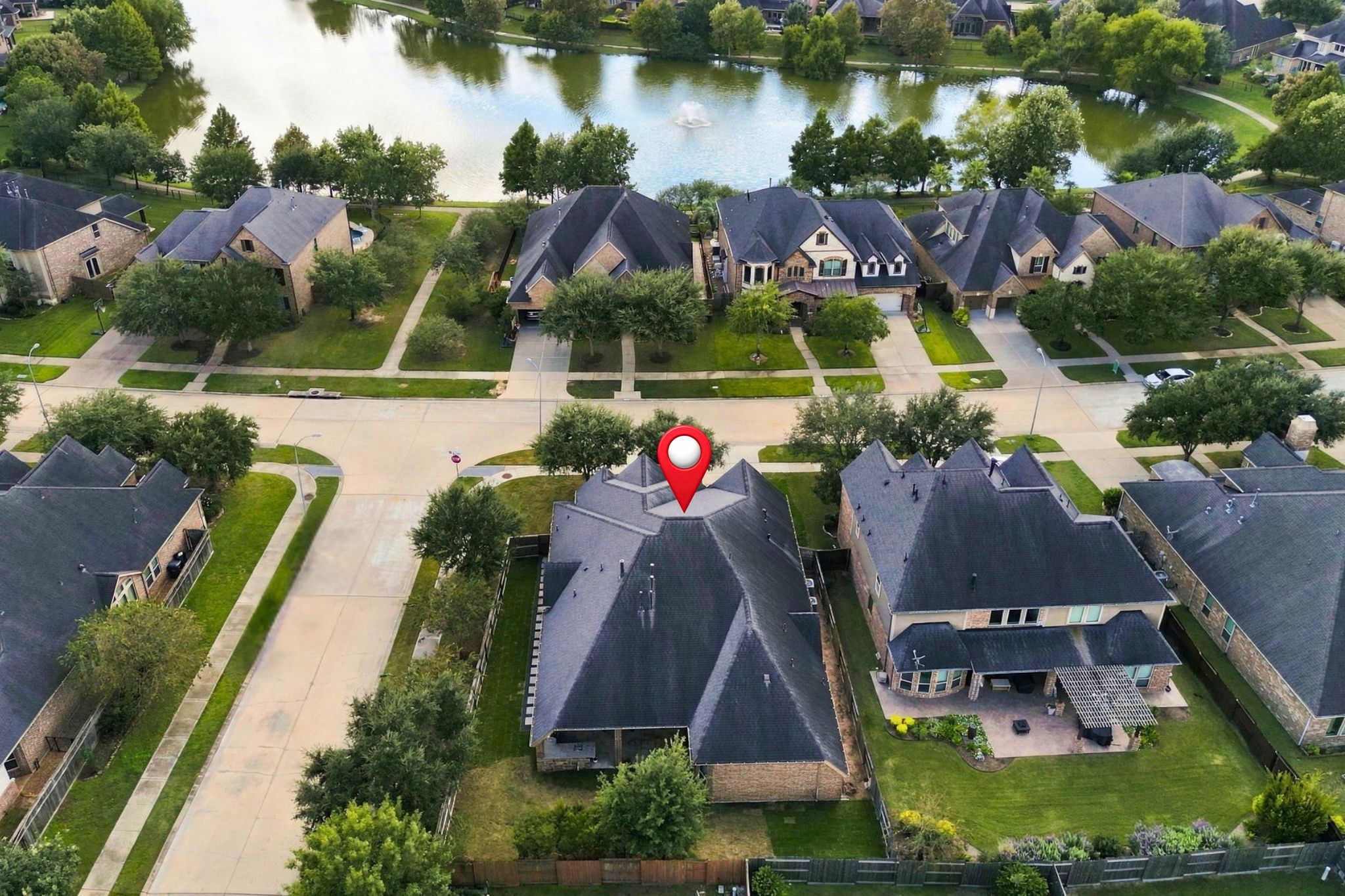 Conveniently located across the street from one of the neighborhood's many lakes, this home also offers easy access to Randolph Elementary School, shopping, and grocery stores, making everyday errands and school drop-offs a breeze.
