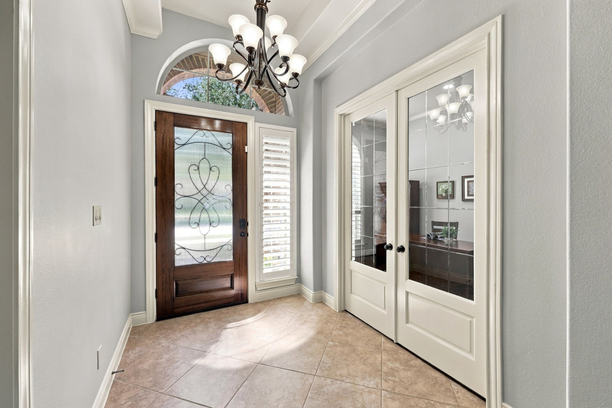Located at the front of the home, the private Home Office is accessed through elegant double glass doors, offering a quiet and dedicated space for working from home or managing daily tasks. Located at the front of the home, the private Home Office is accessed through elegant double glass doors, offering a quiet and dedicated space for working from home or managing daily tasks.
