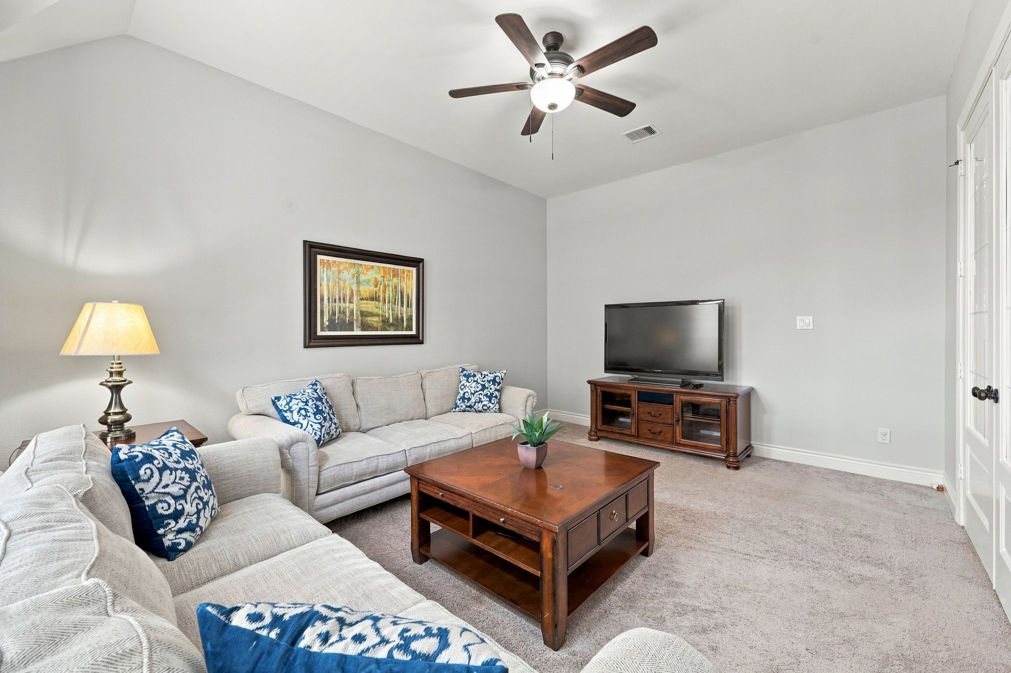 Located just off the Breakfast Area and accessed through elegant double glass doors, the spacious Gameroom offers versatile options for entertaining and relaxation. This flexible space can also serve as a Media Room, with plenty of room for comfortable seating and a large wall ideal for mounting an oversized flat-screen TV. Whether used for movie nights, game days, or a dedicated recreation space, this room offers endless possibilities to suit your lifestyle.