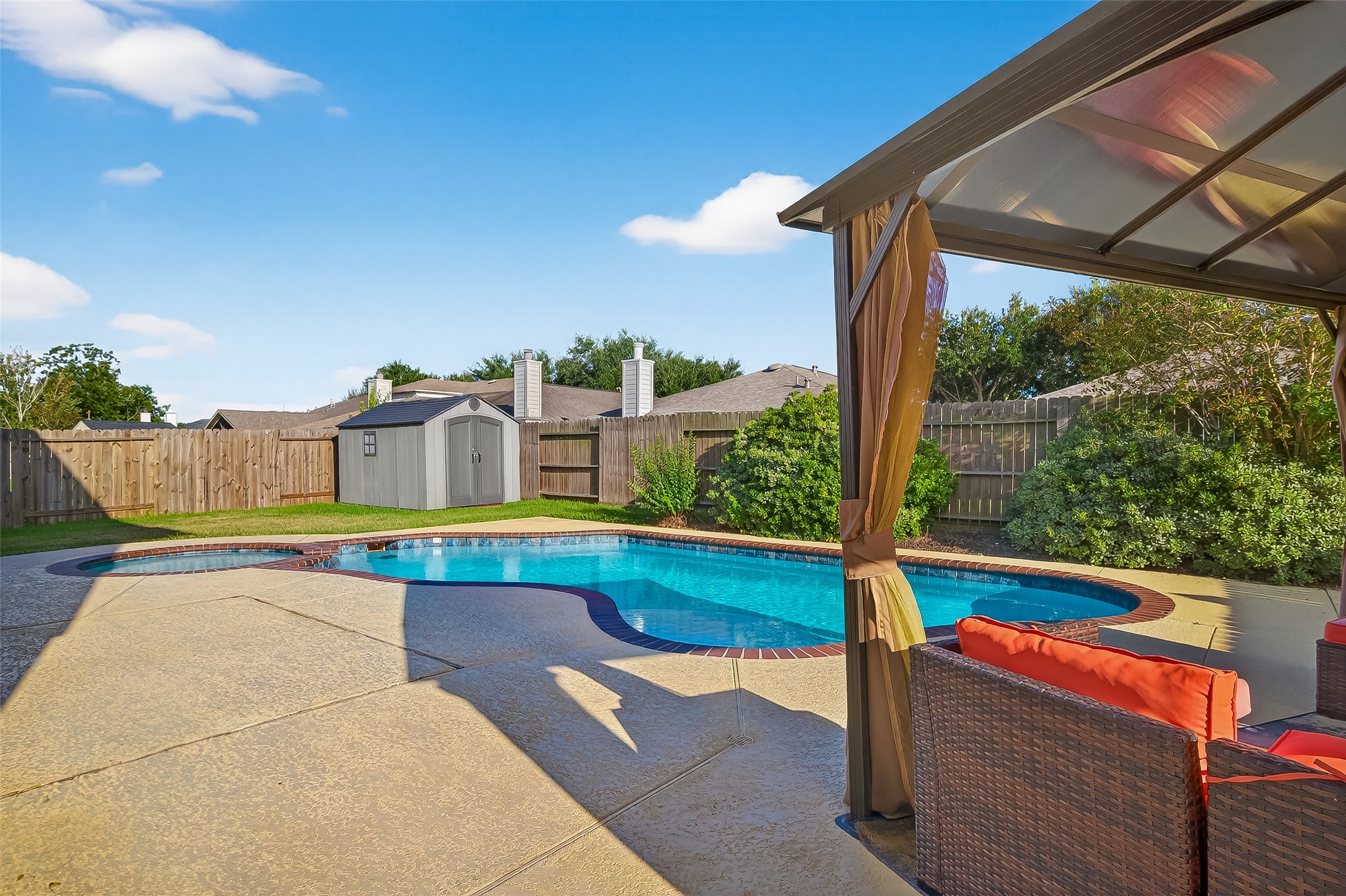 Beautiful pergola keeps you covered and cool on a hot summer day.