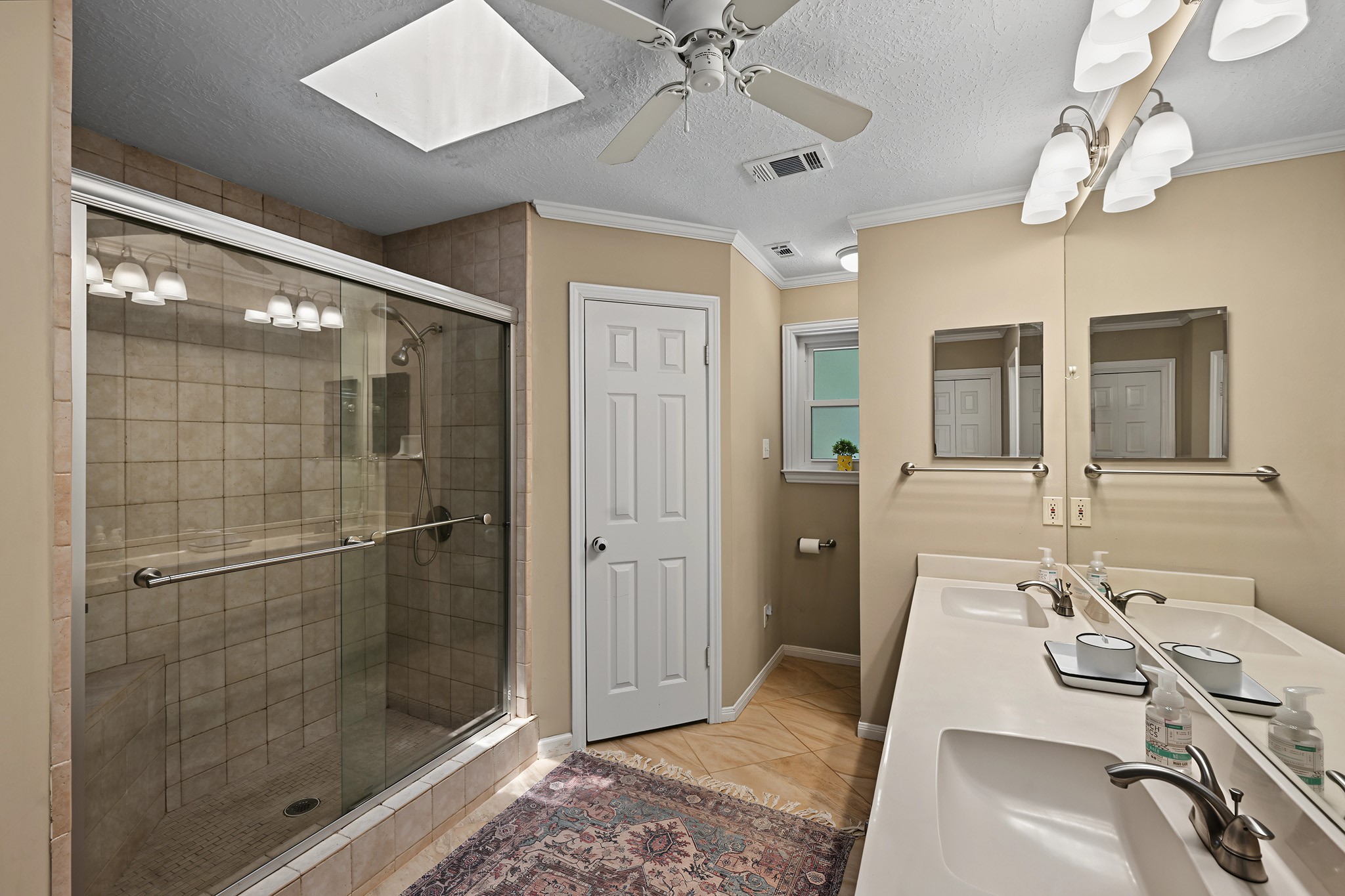 Lovely primary bath with walk in shower.
