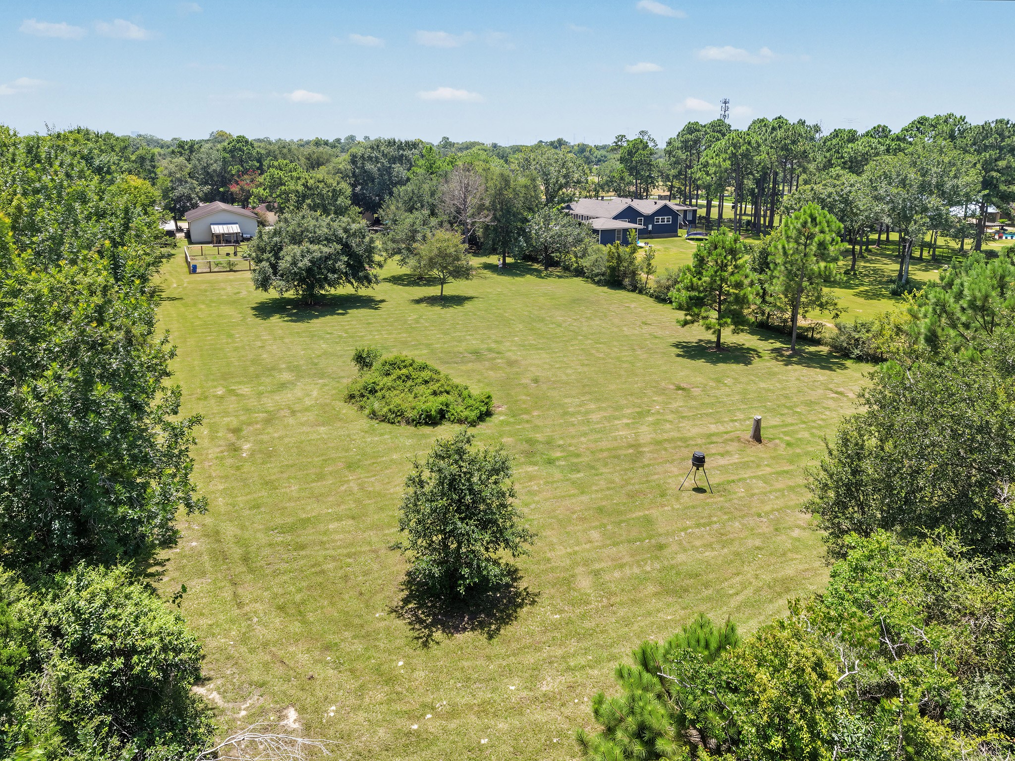 Fabulous acreage and the ability to add structures or an outdoor oasis!
