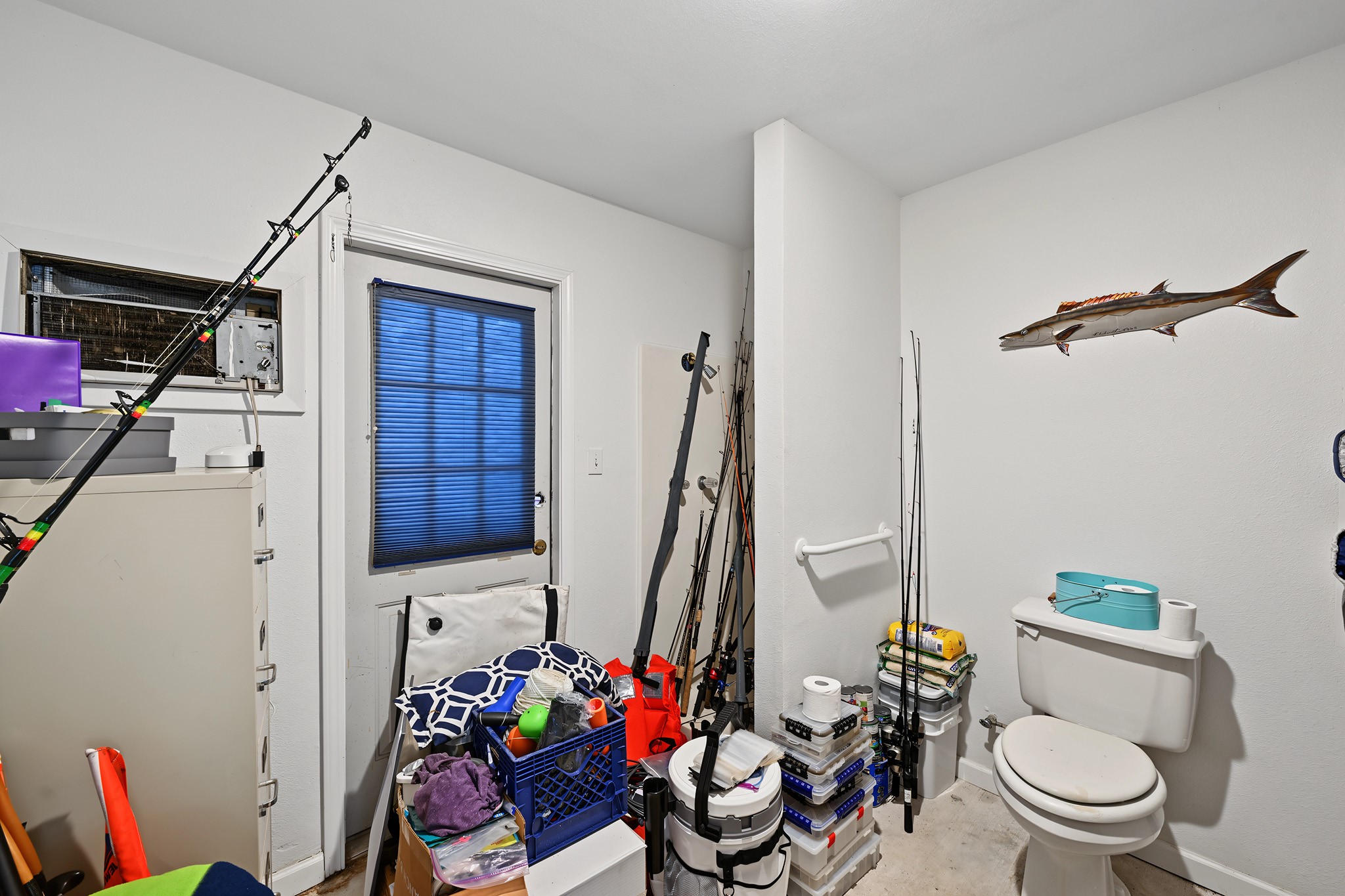 Guest bath that is located off the garage for convenience too!