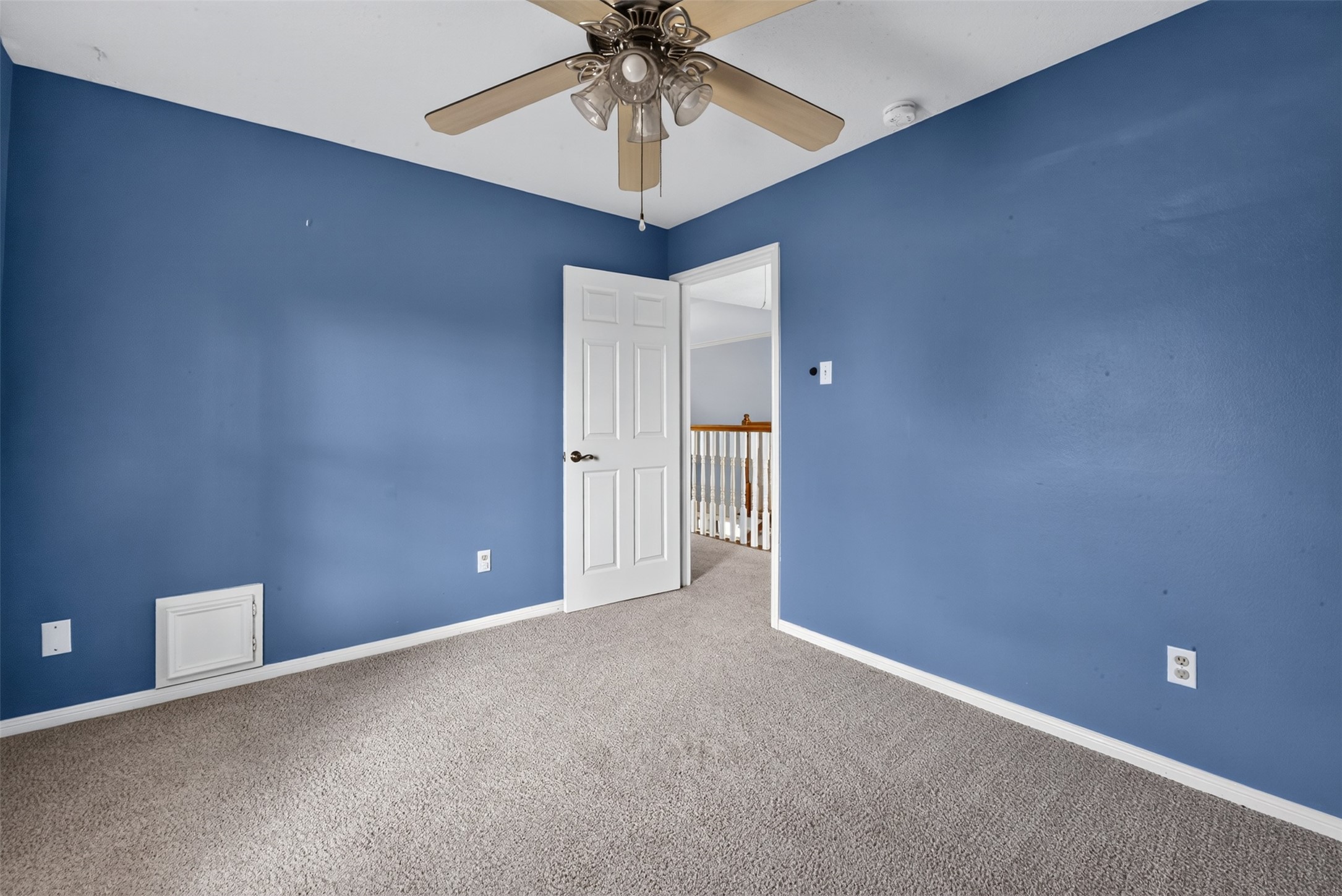 To the right at the back is another bedroom.
