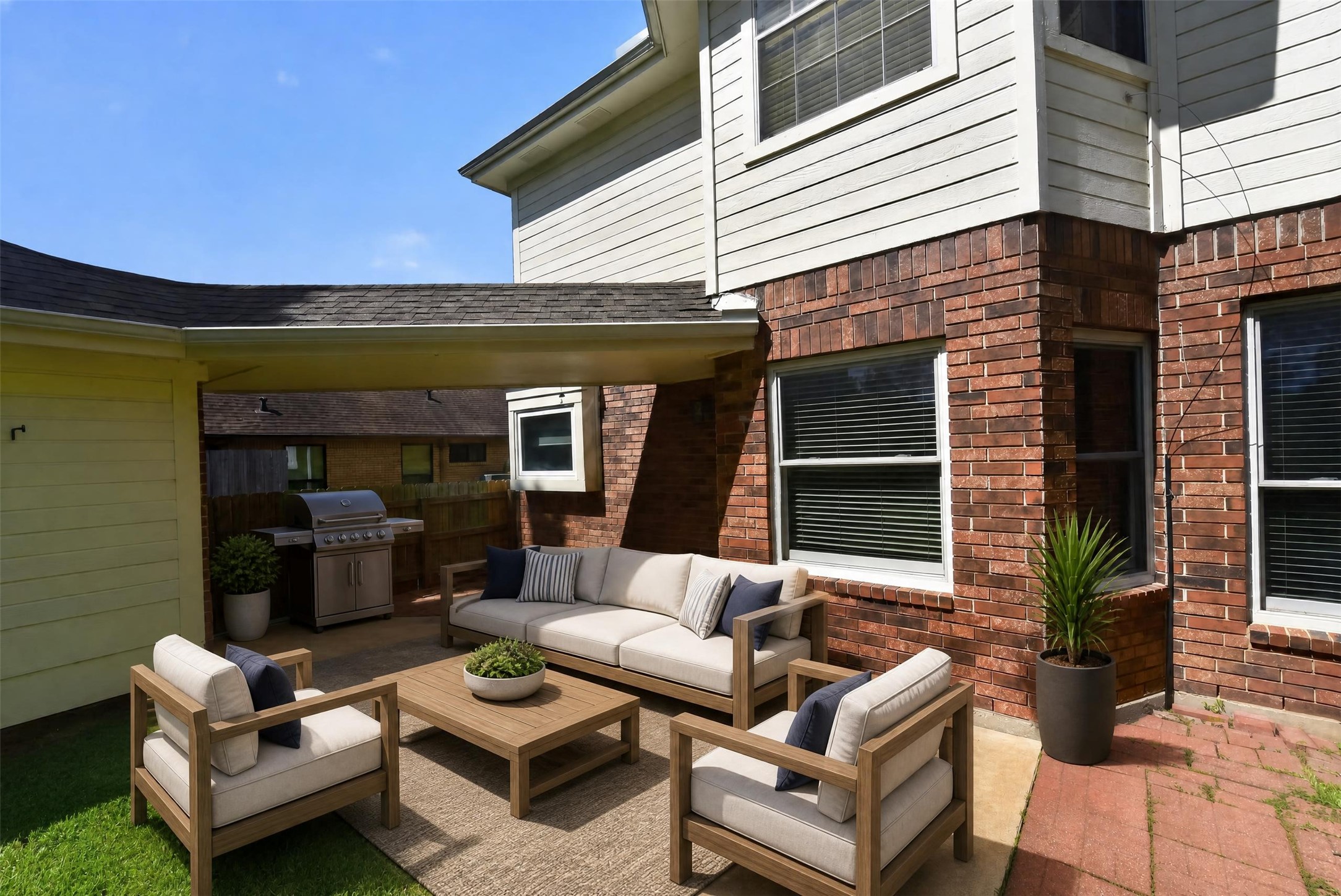 Head out to the backyard and imagine how your belongings will look in this virtually staged yard.