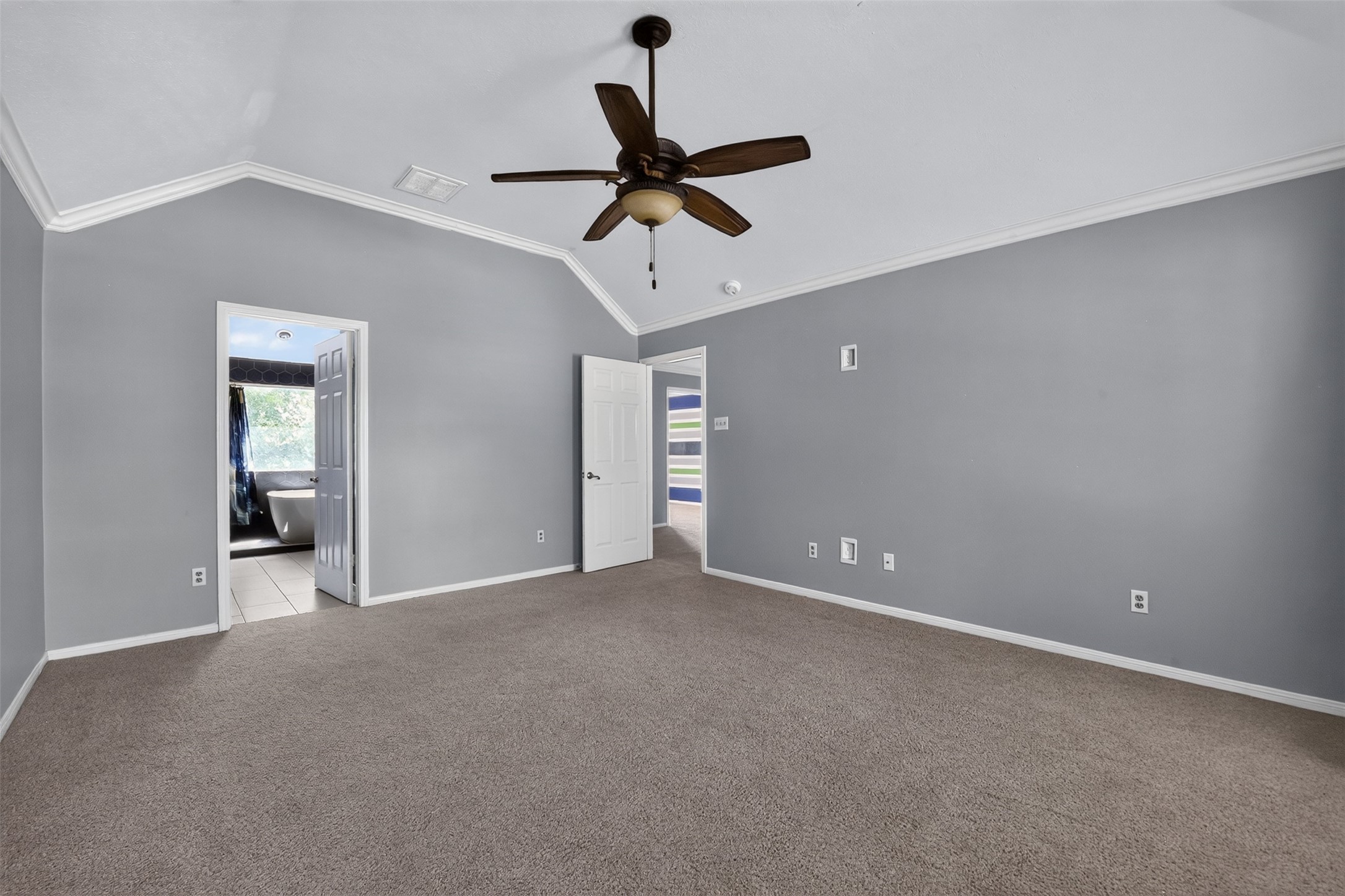 Retire after a long day to your elegant primary suite.