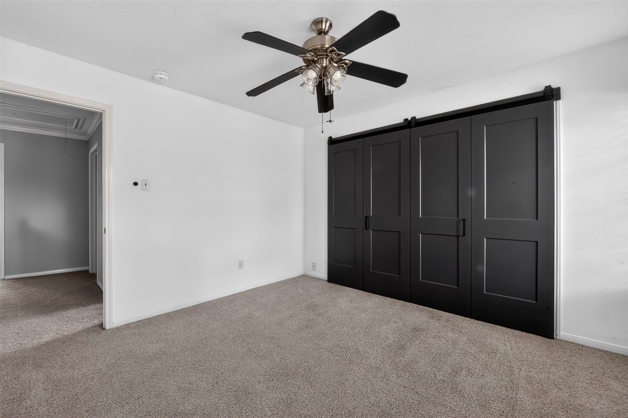 Last bedroom is at the front and has sliding closet doors.