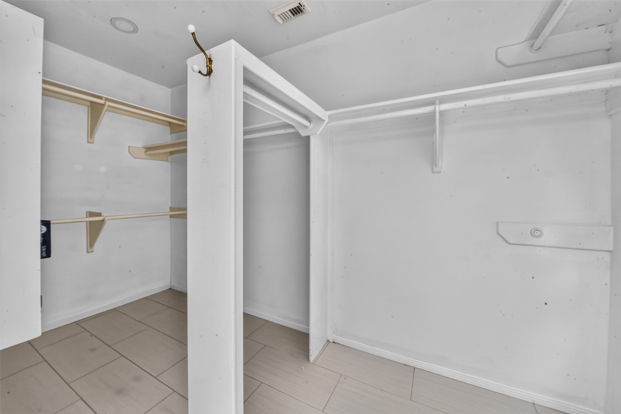 Walk in closet has room for all of your clothes and shoes.