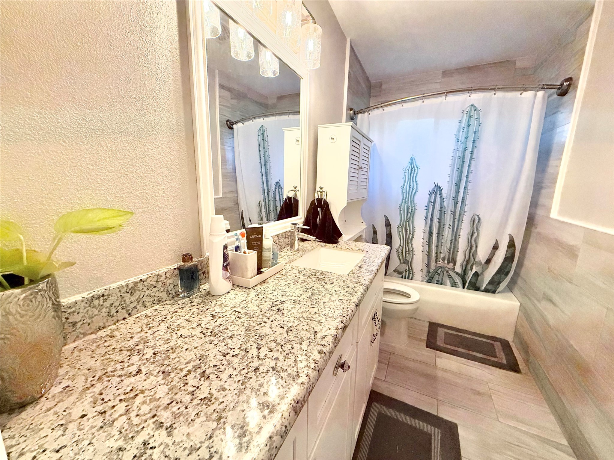 Again with Granite countertops and floor to ceiling tile.