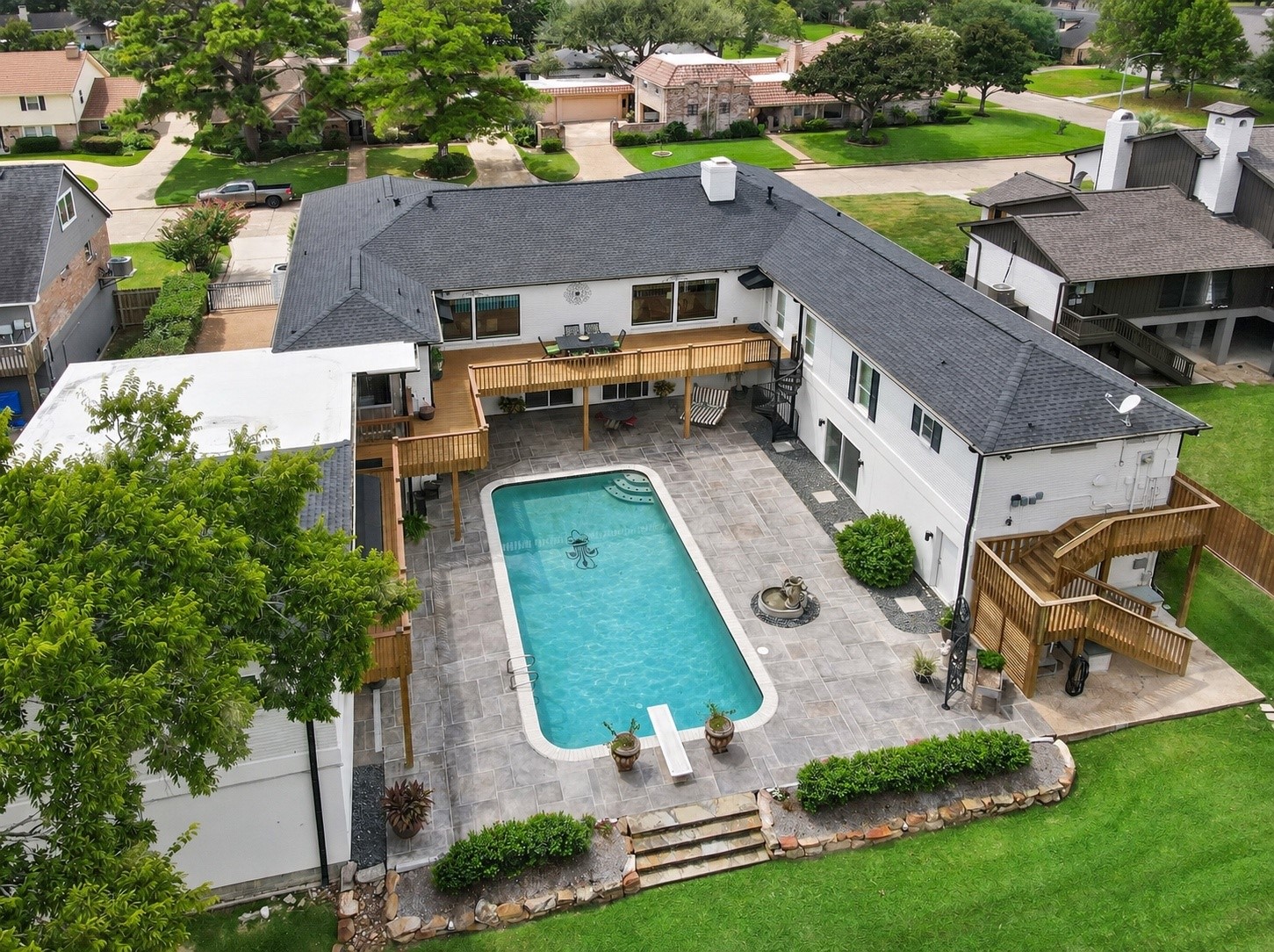 Aerial view showcasing the roof, which was replaced by Brinkmann Roofing in September 2024 with durable GAF fiberglass shingles.