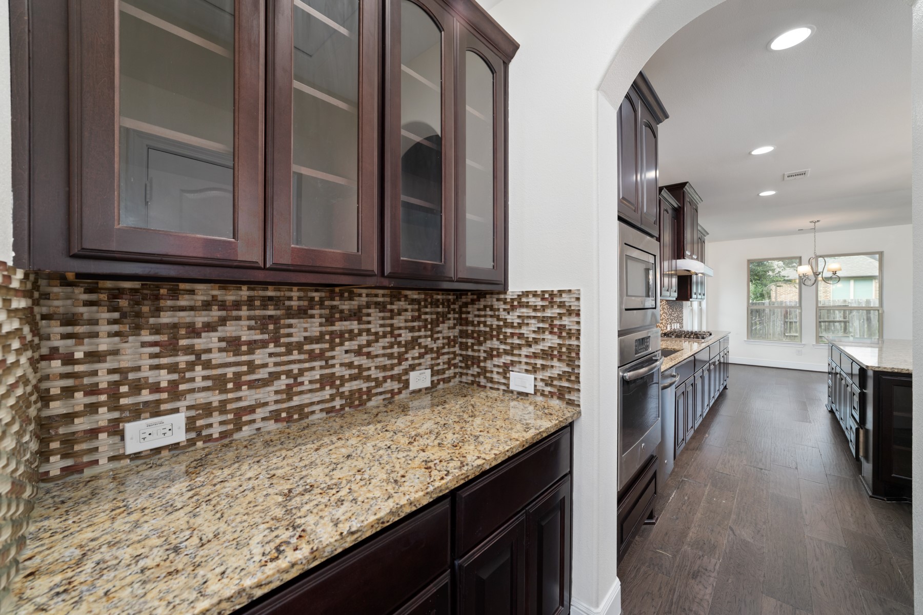 A bulter's pantry is perfect to store away your party items, wine glasses and additional entertainment items.