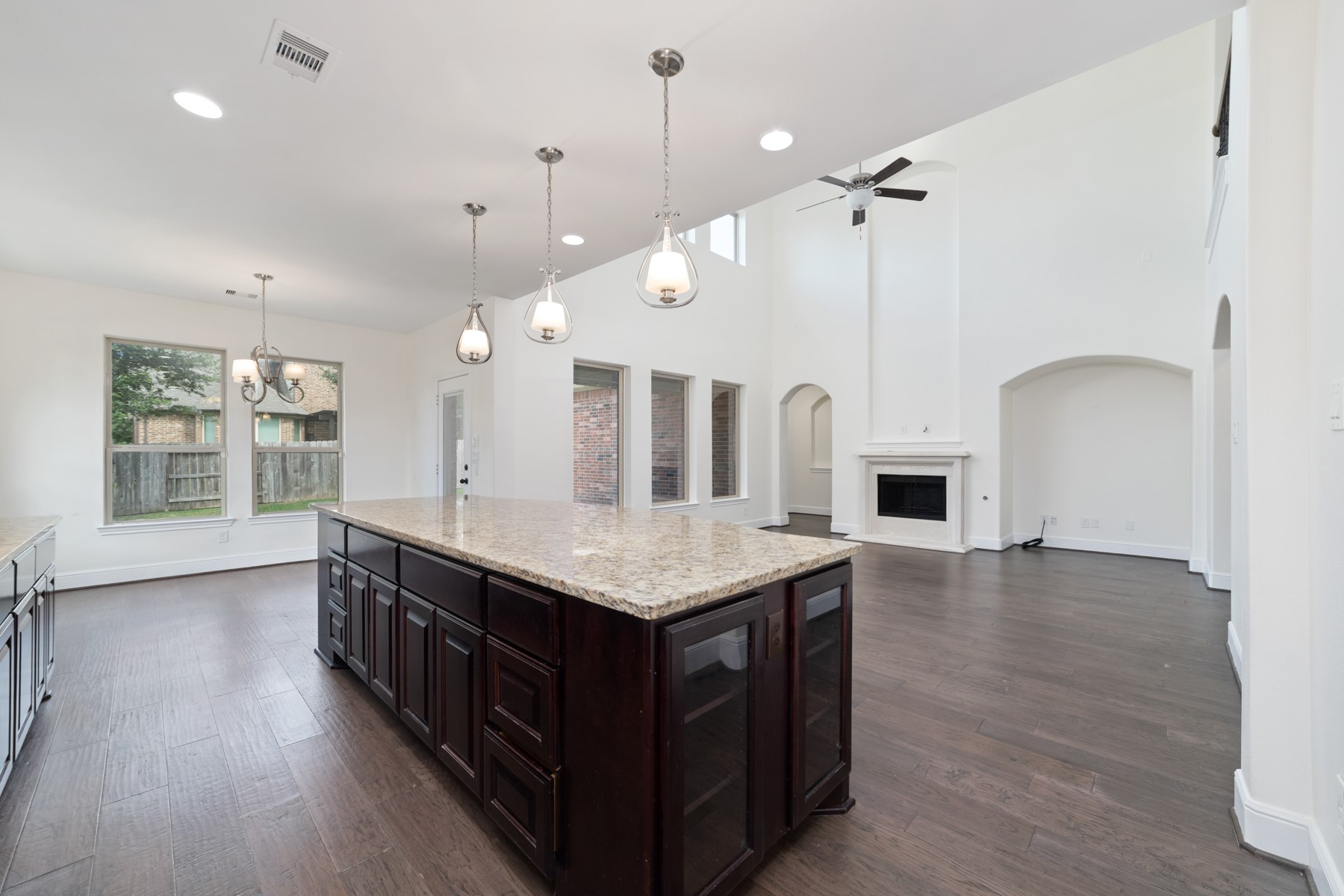 More ample natural light from multiple windows, leading to a bright breakfast area for family gatherings.