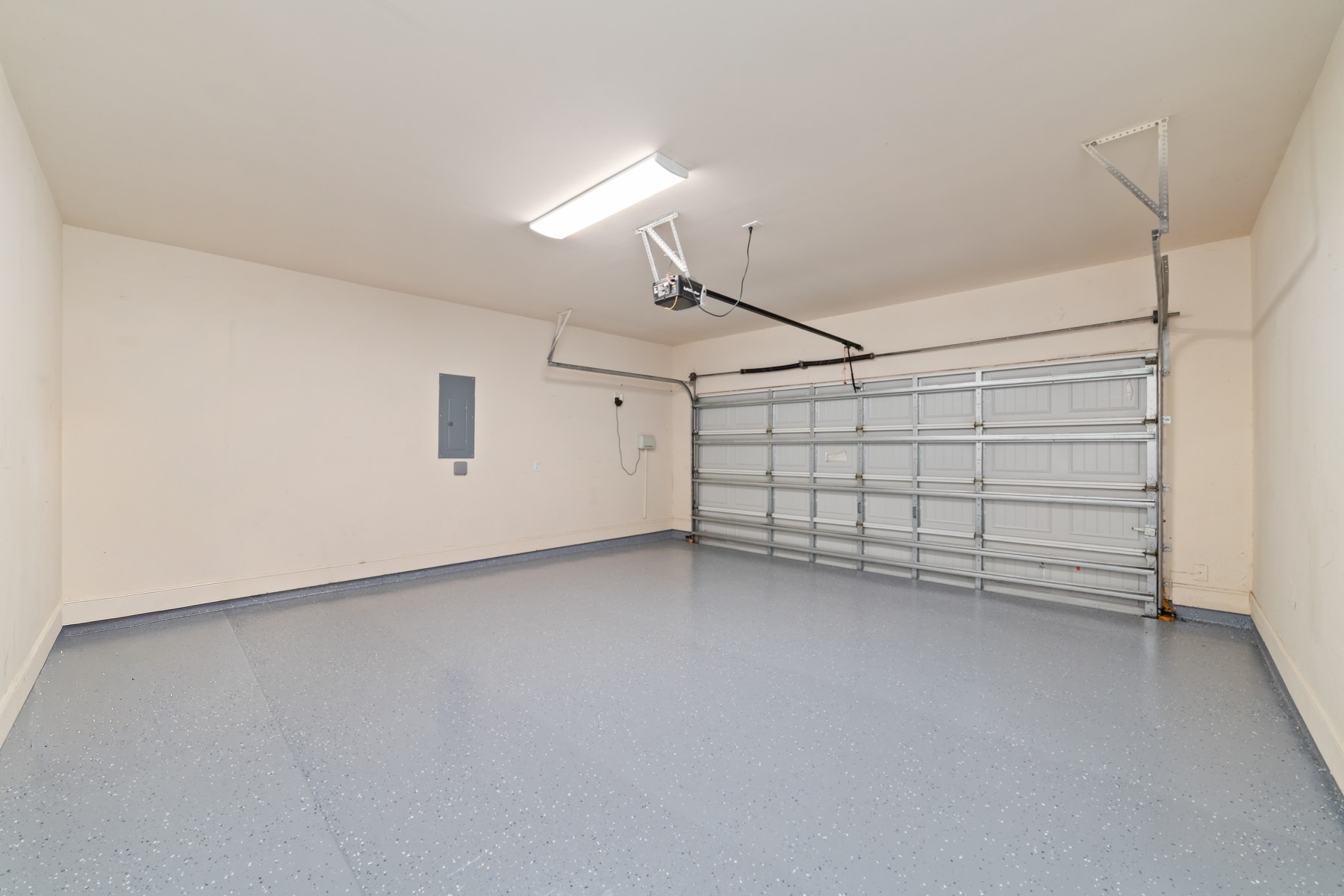 2-car garage with a durable epoxy-coated floor for a clean, finished look