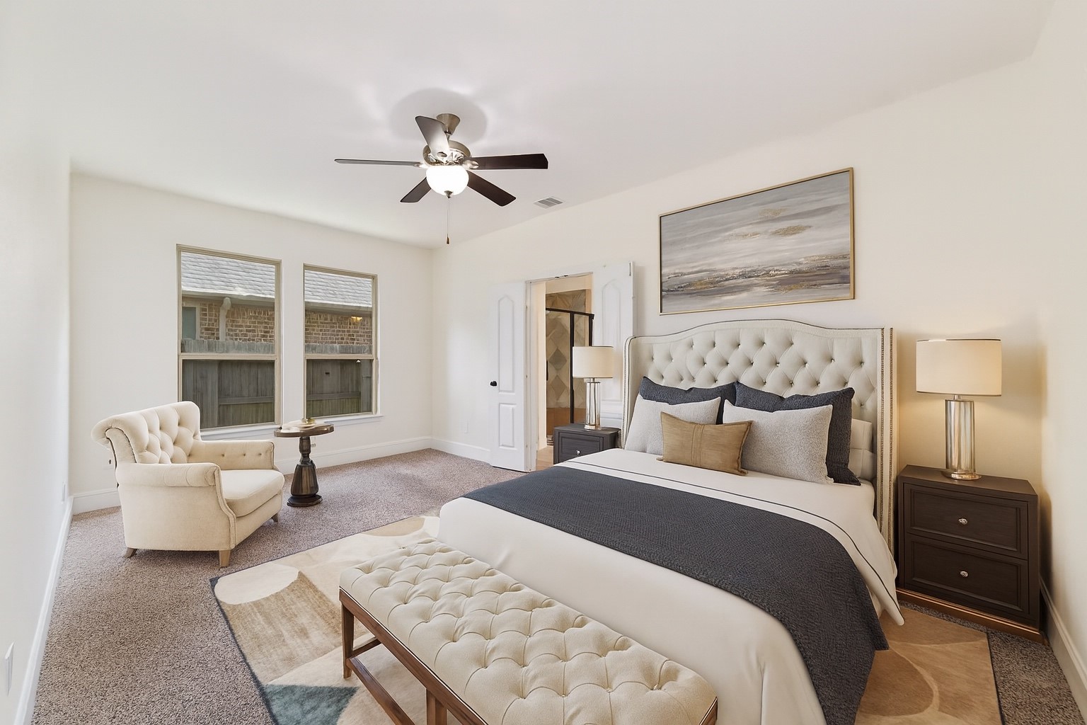 Virtually staged - Second primary bedroom in the house on the first floor.