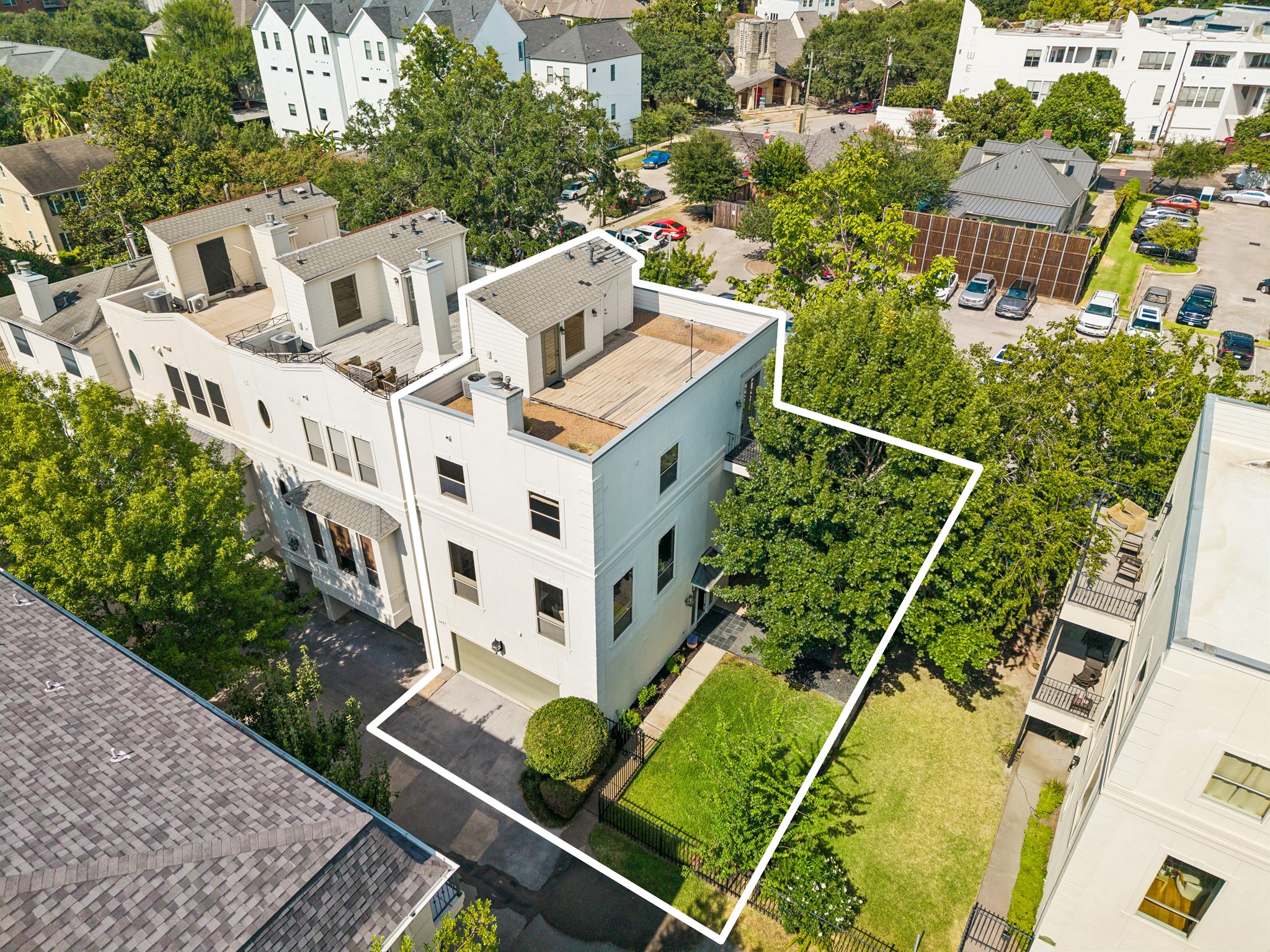 Aerial view outlining the property and the approximately 3,000 square-foot lot.