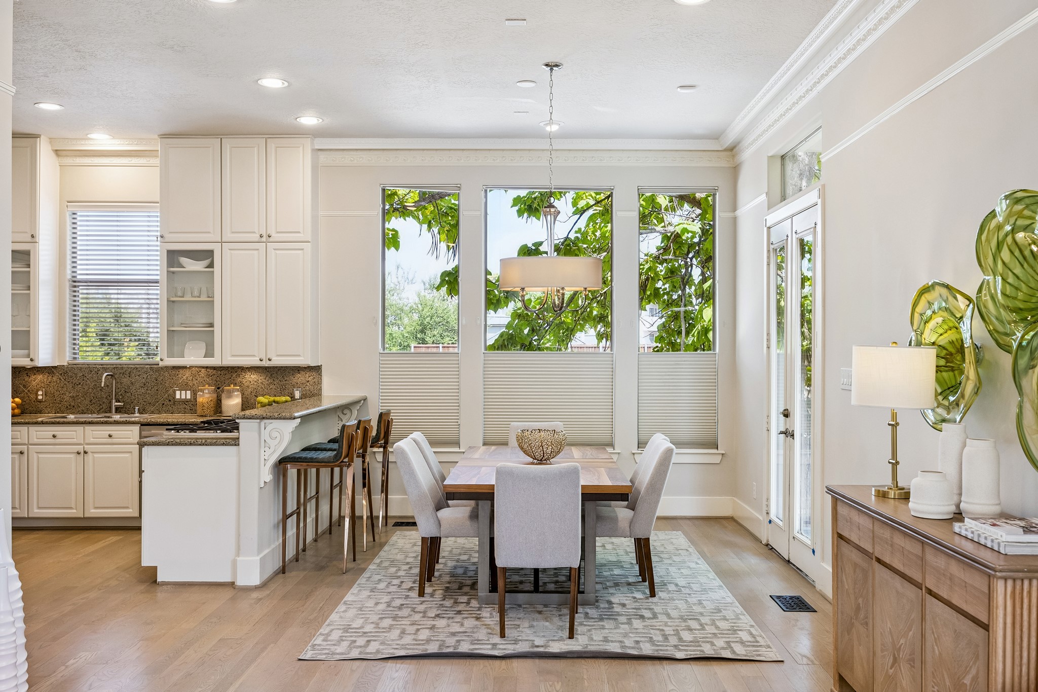 Dining area adjoining the kitchen with access to a private balcony.
