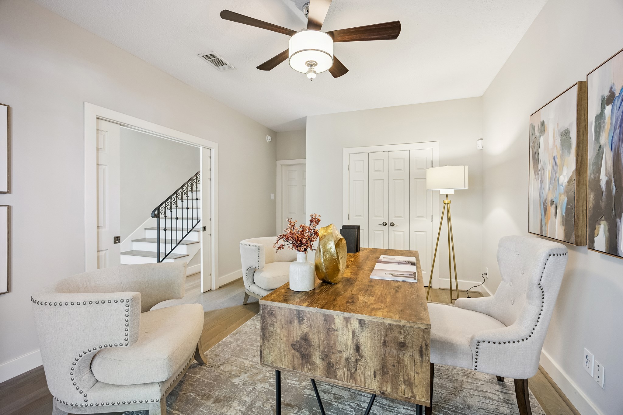 Private first-floor bedroom offers flexible use as a guest suite or home office.