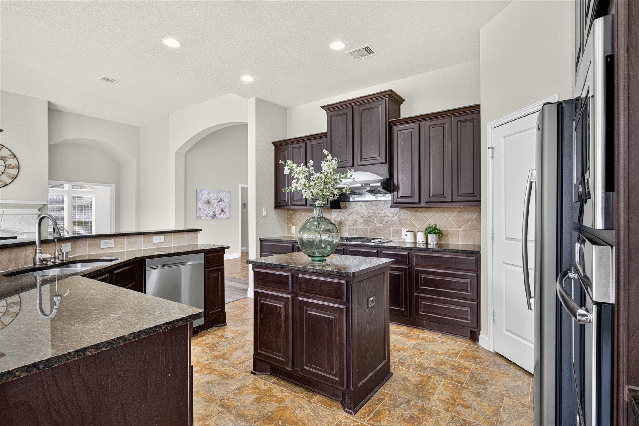 The heart of the home! A chef's kitchen designed for baking weekend treats and preparing delicious everyday meals together.