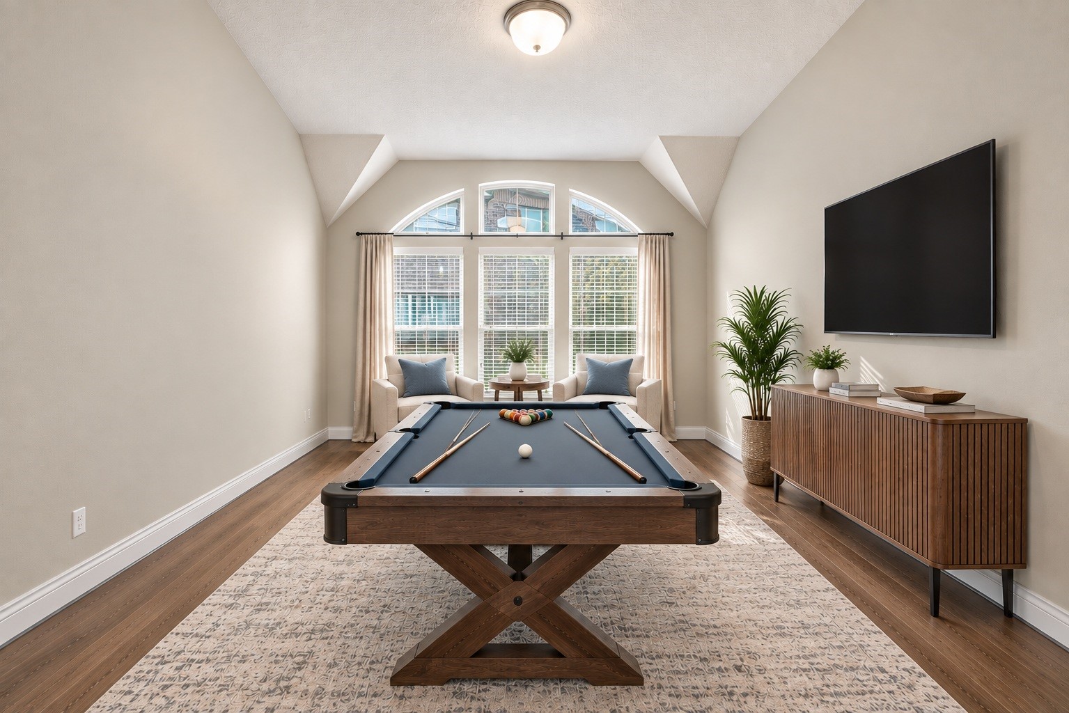 Versatile game room filled with possibilitiesideal for board games, playtime, or a family media space. (virtual staged) Versatile game room filled with possibilitiesideal for board games, playtime, or a family media space. (virtual staged)