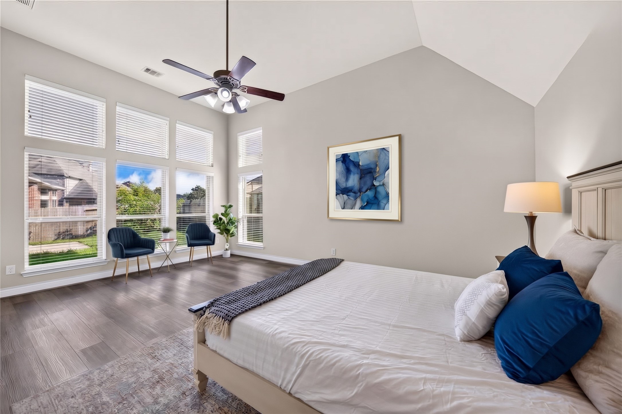 Spacious primary bedroom with plenty of room for a cozy reading nook or sitting area to unwind at the end of the day.