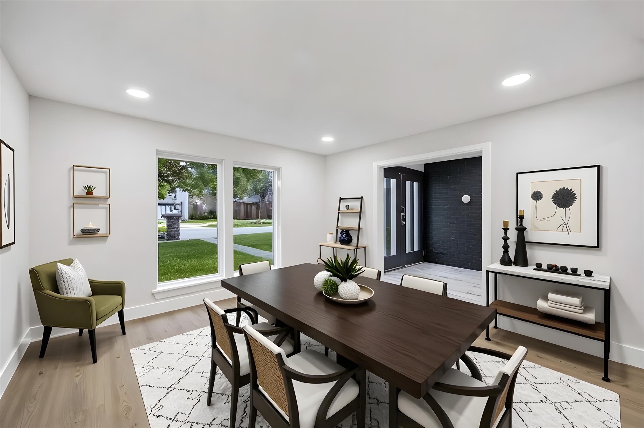 staged formal dining area at the front of the home.