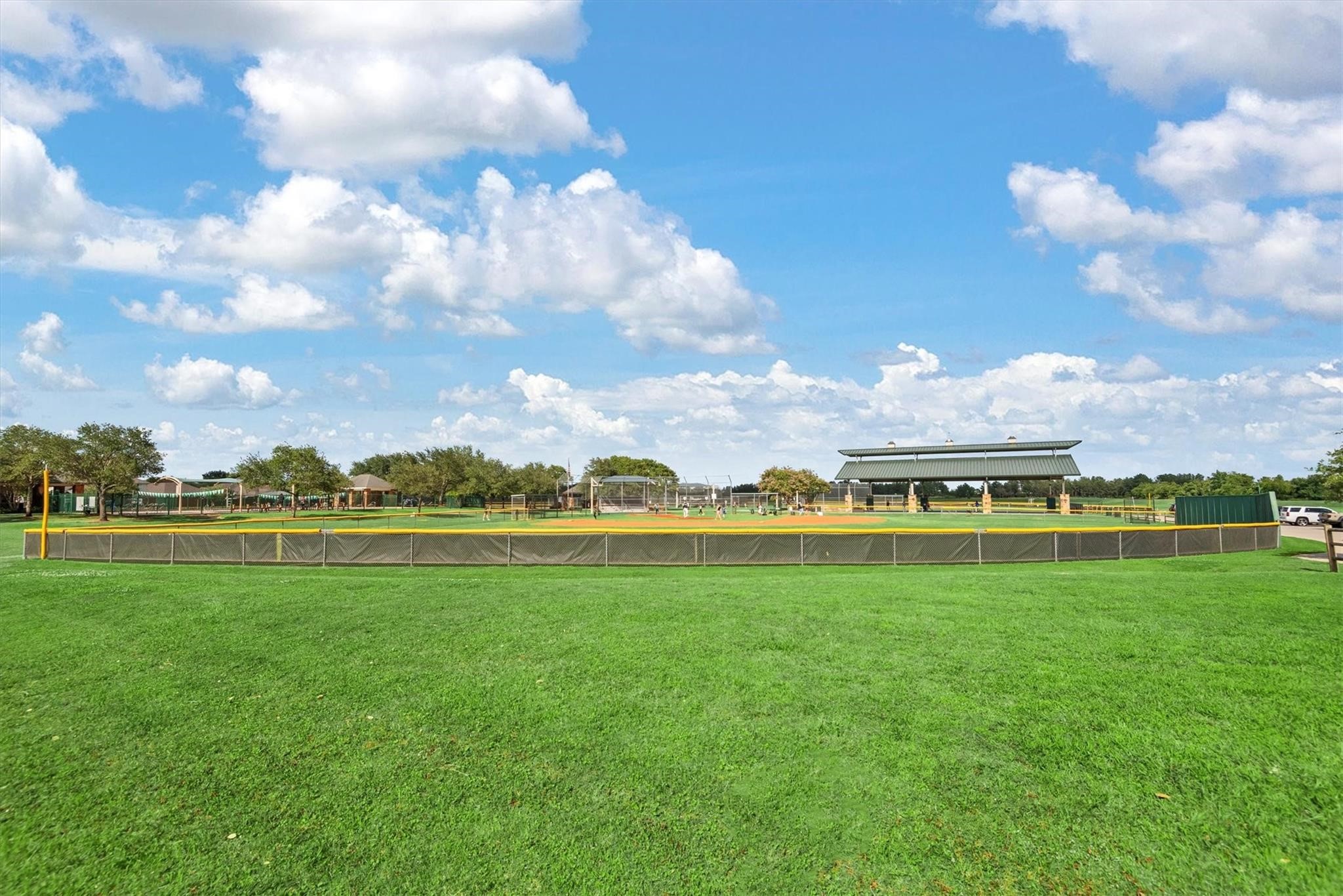 Athletic Center w/baseball fields, volleyball, soccer, pickleball courts, playground and competition pool