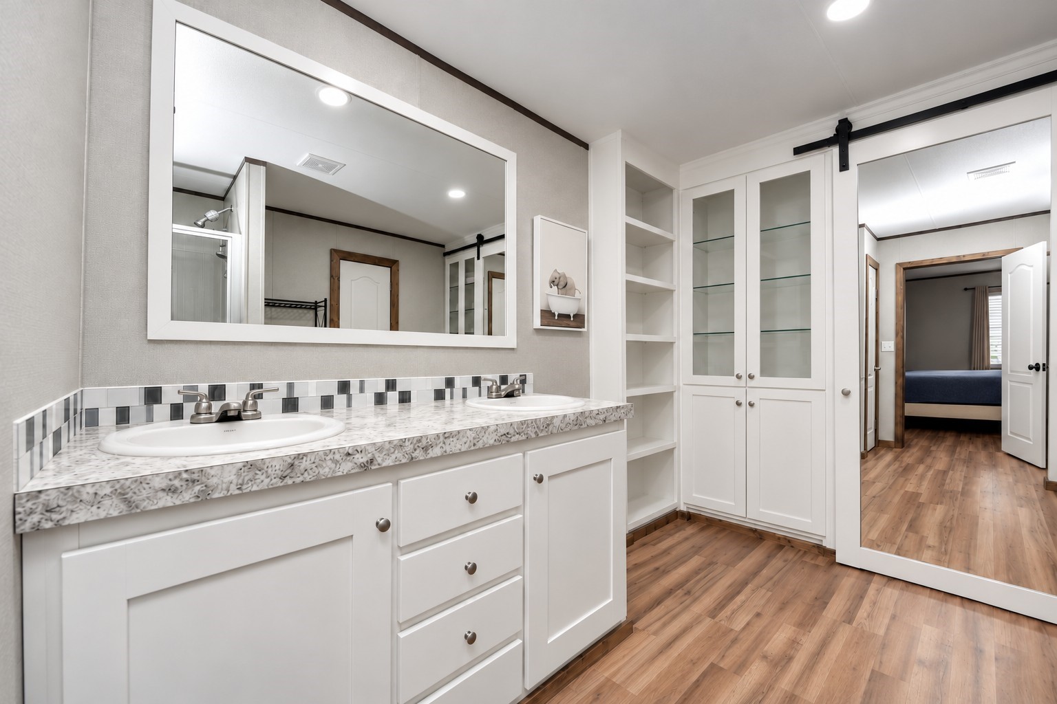 Primary bathroom with double sinks.
