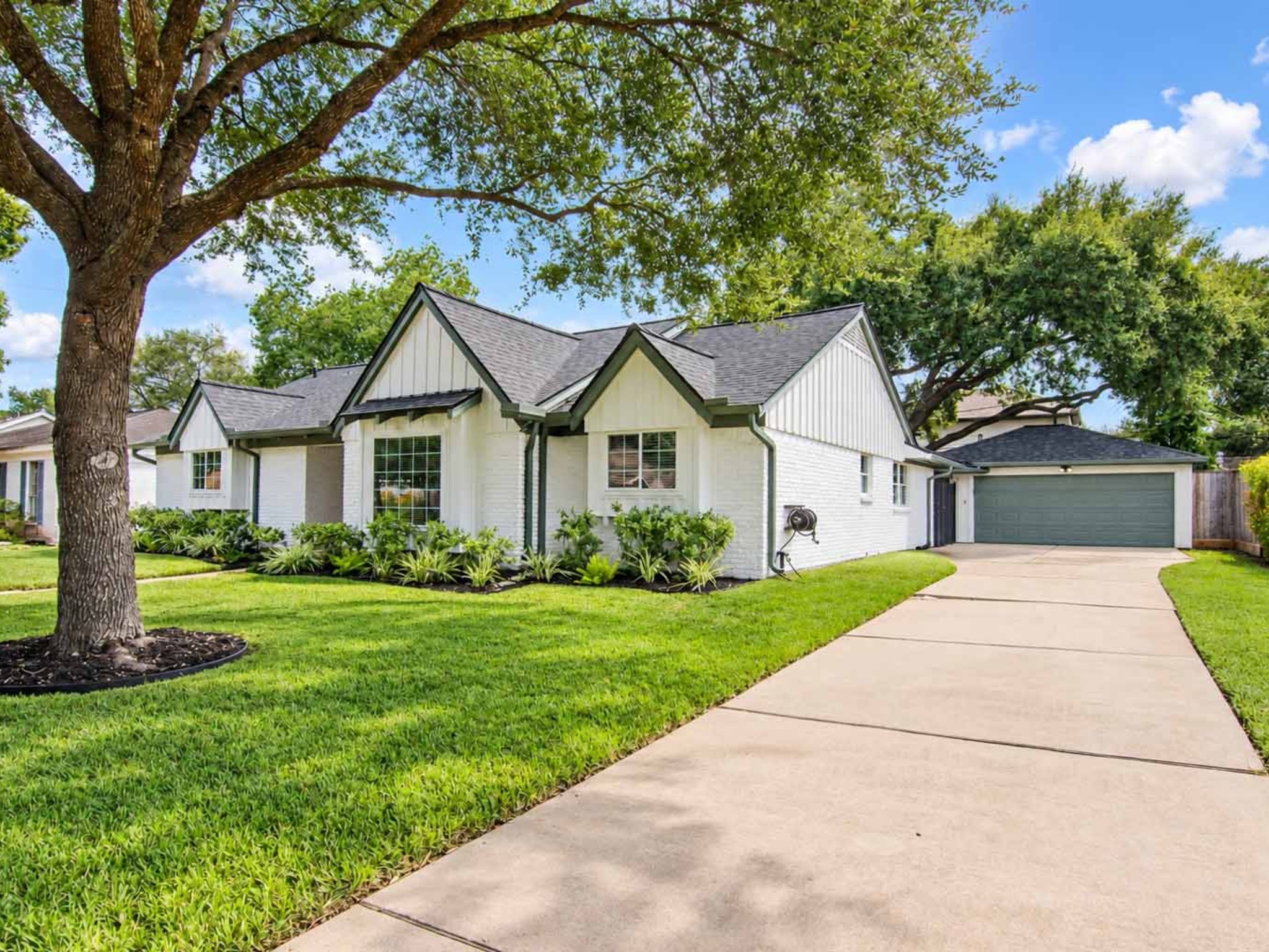 Extended driveway with a two car garage.