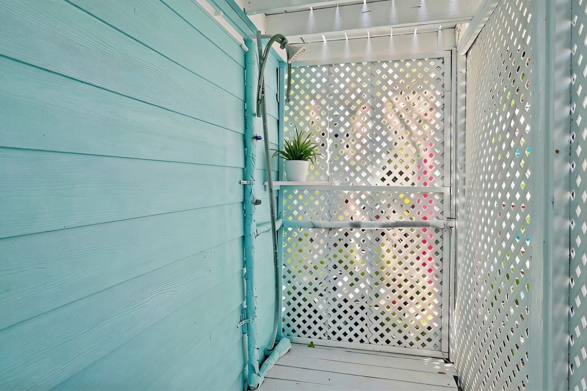 Outdoor Beach Shower: Enjoy the convenience of this first-floor outdoor beach shower, complete with privacy lattice and coastal-inspired turquoise siding. Perfect for rinsing off sand and saltwater after a sun-filled day at Galveston's beautiful beachesa desirable amenity for coastal living and vacation guests!