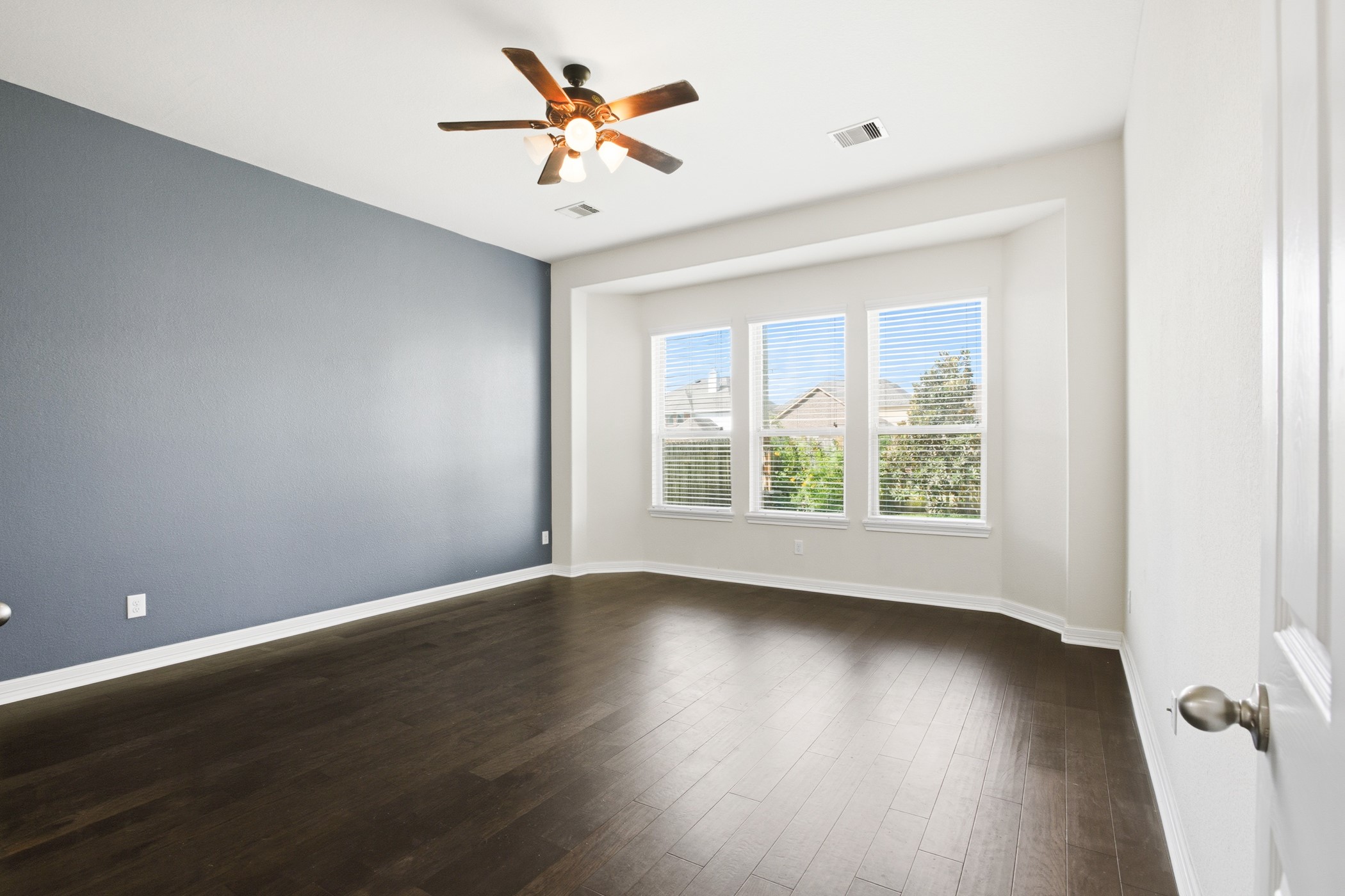Brand new wood flooring in primary suite