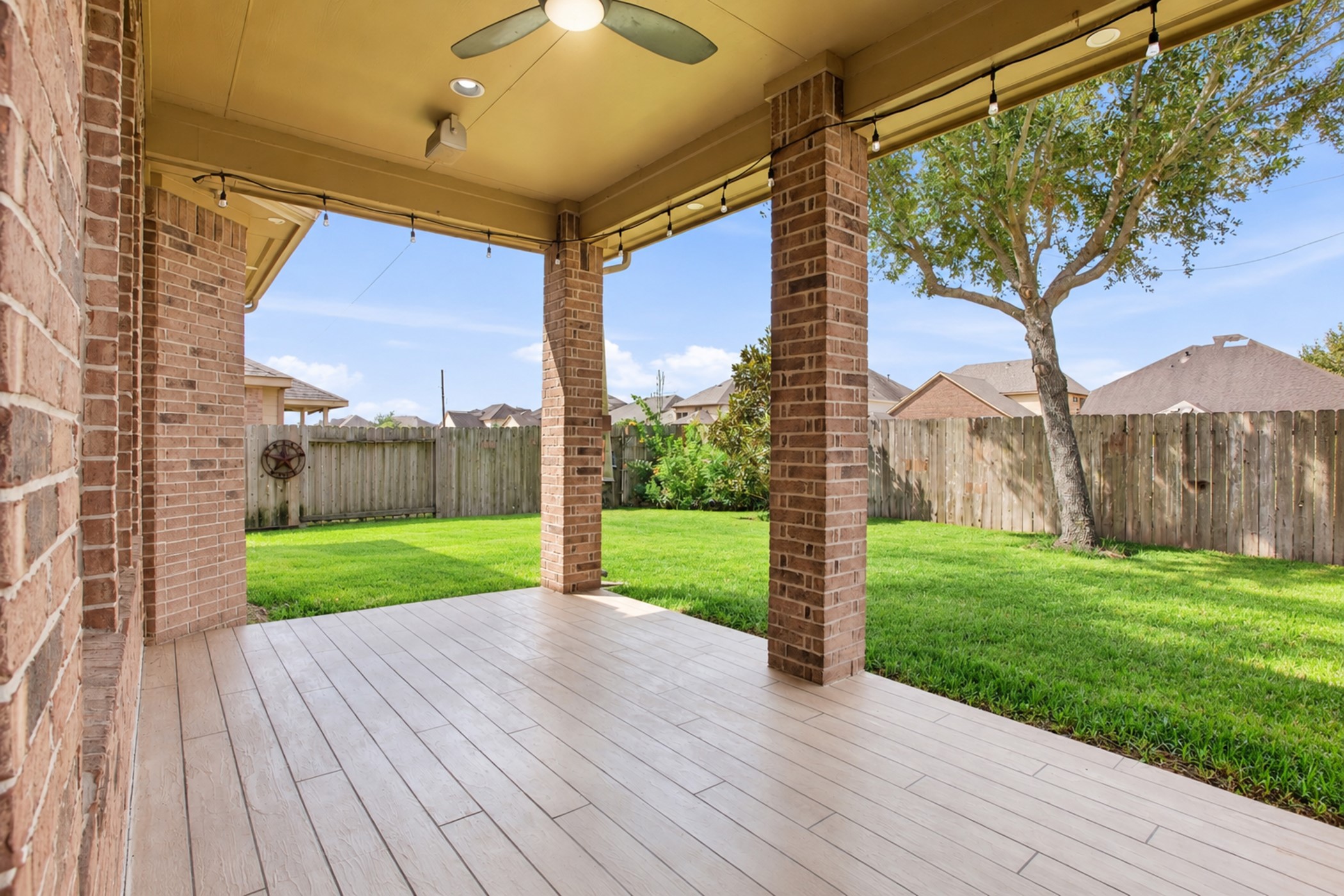 Wow! Custom designed and extended covered outdoor patio!