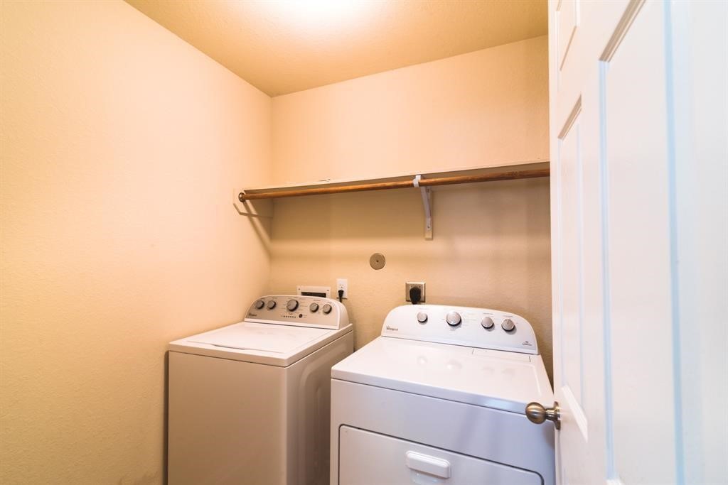 Utility room. Washer and dryer included with this property.