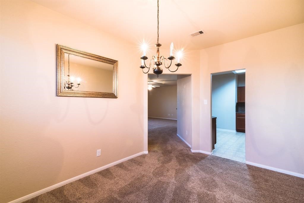 The dining space is to the left of the kitchen