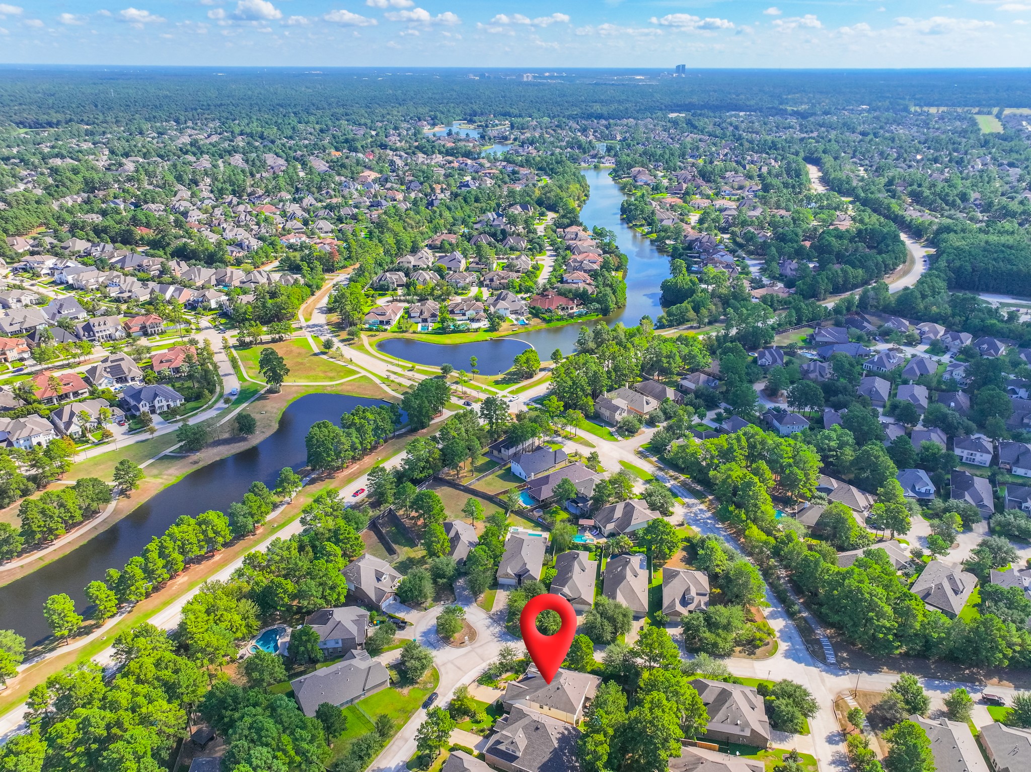 27 E Wolf Cabin Circle, Spring, TX 77389