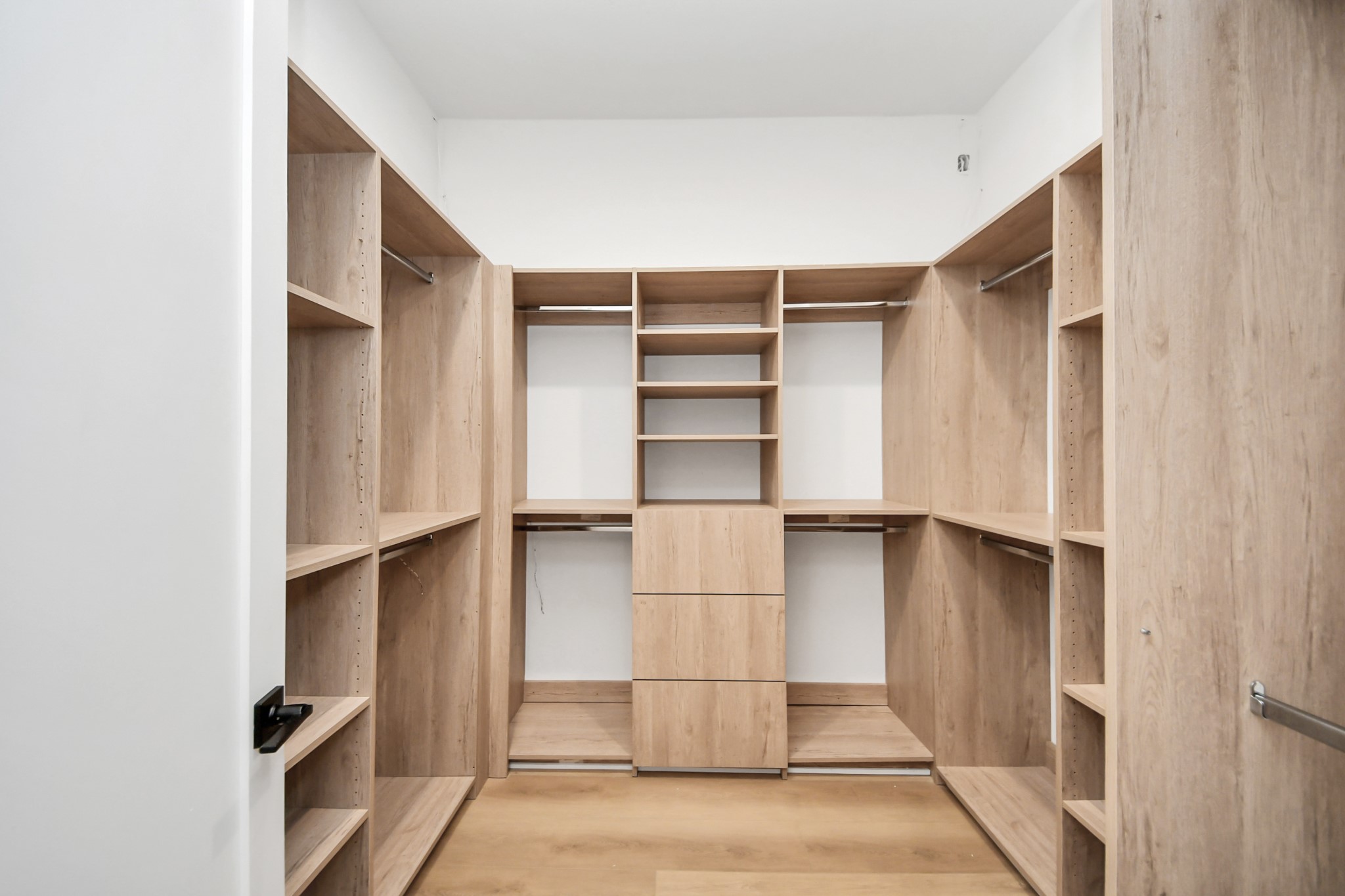 Large primary walk-in closet.